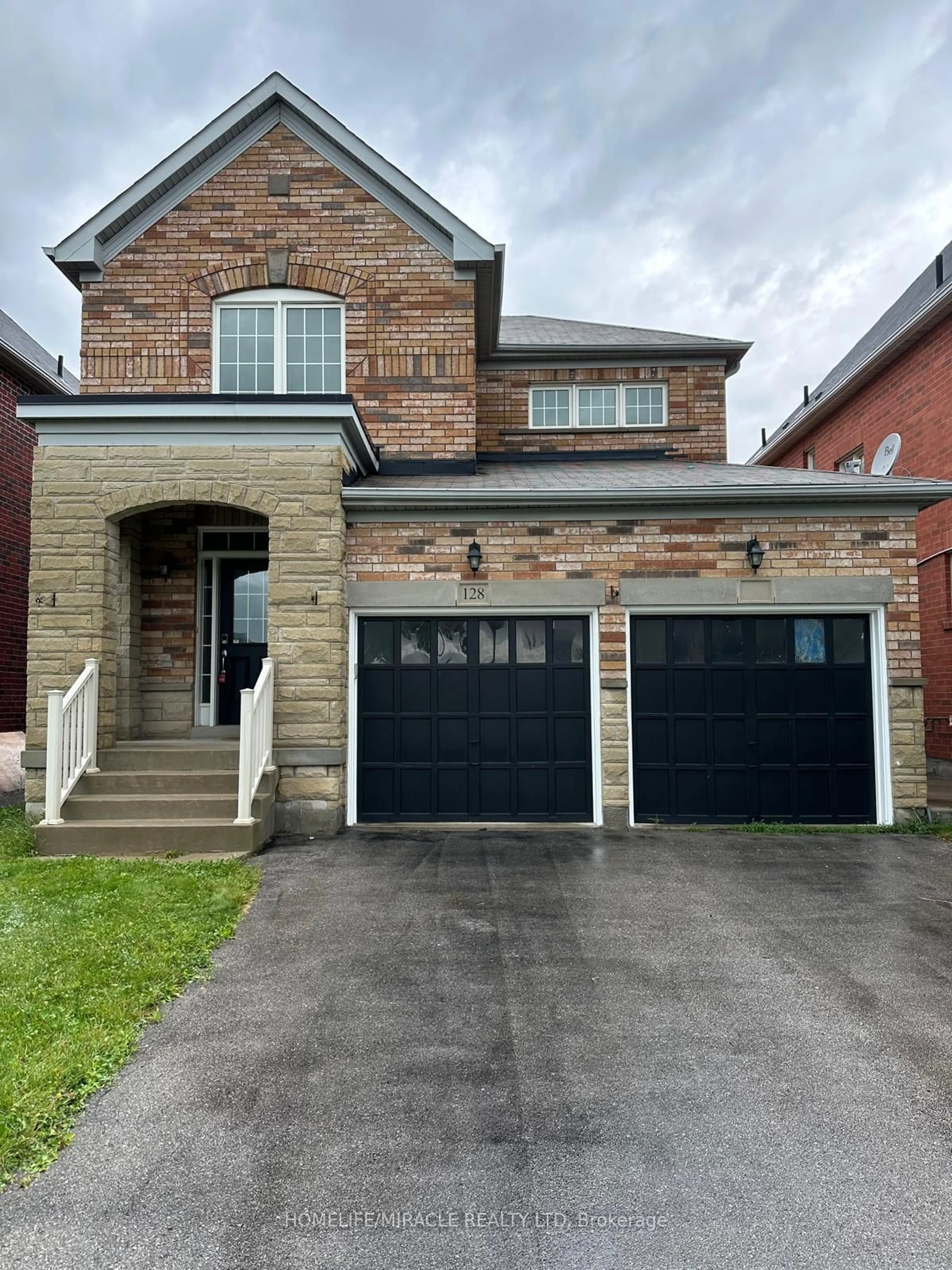 Home with brick exterior material for 128 Summerlyn Tr, Bradford West Gwillimbury Ontario L3Z 0E3