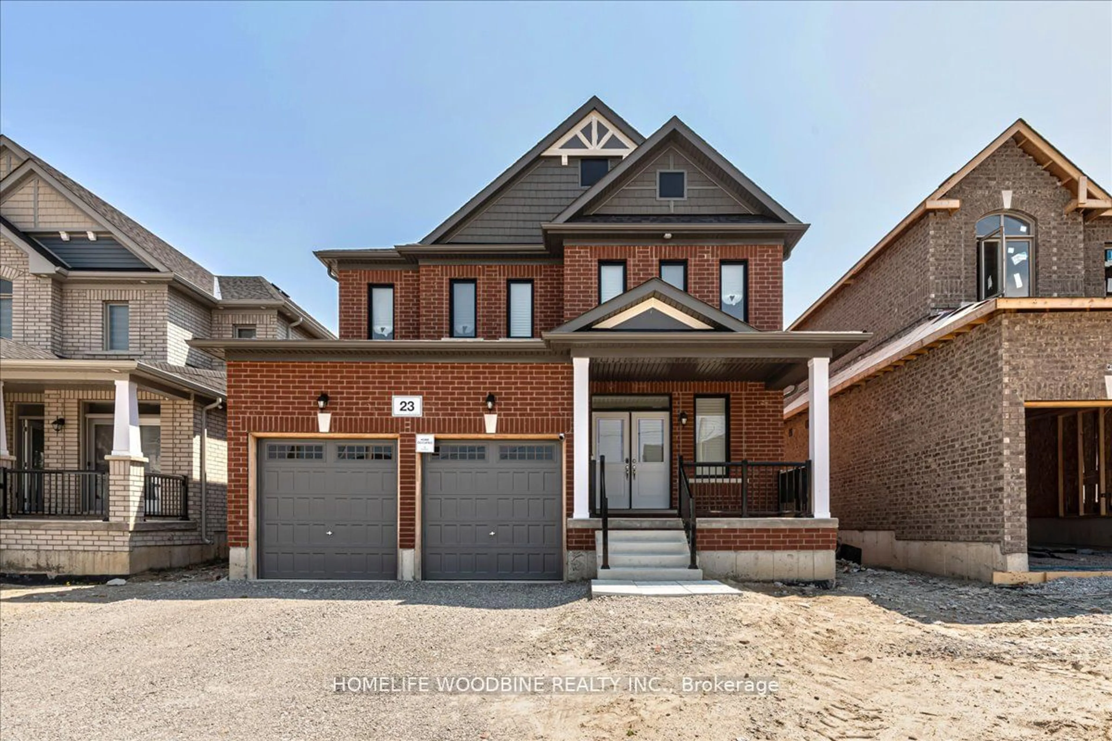 Home with brick exterior material for 23 Wakefield Blvd, Essa Ontario L0M 1B4