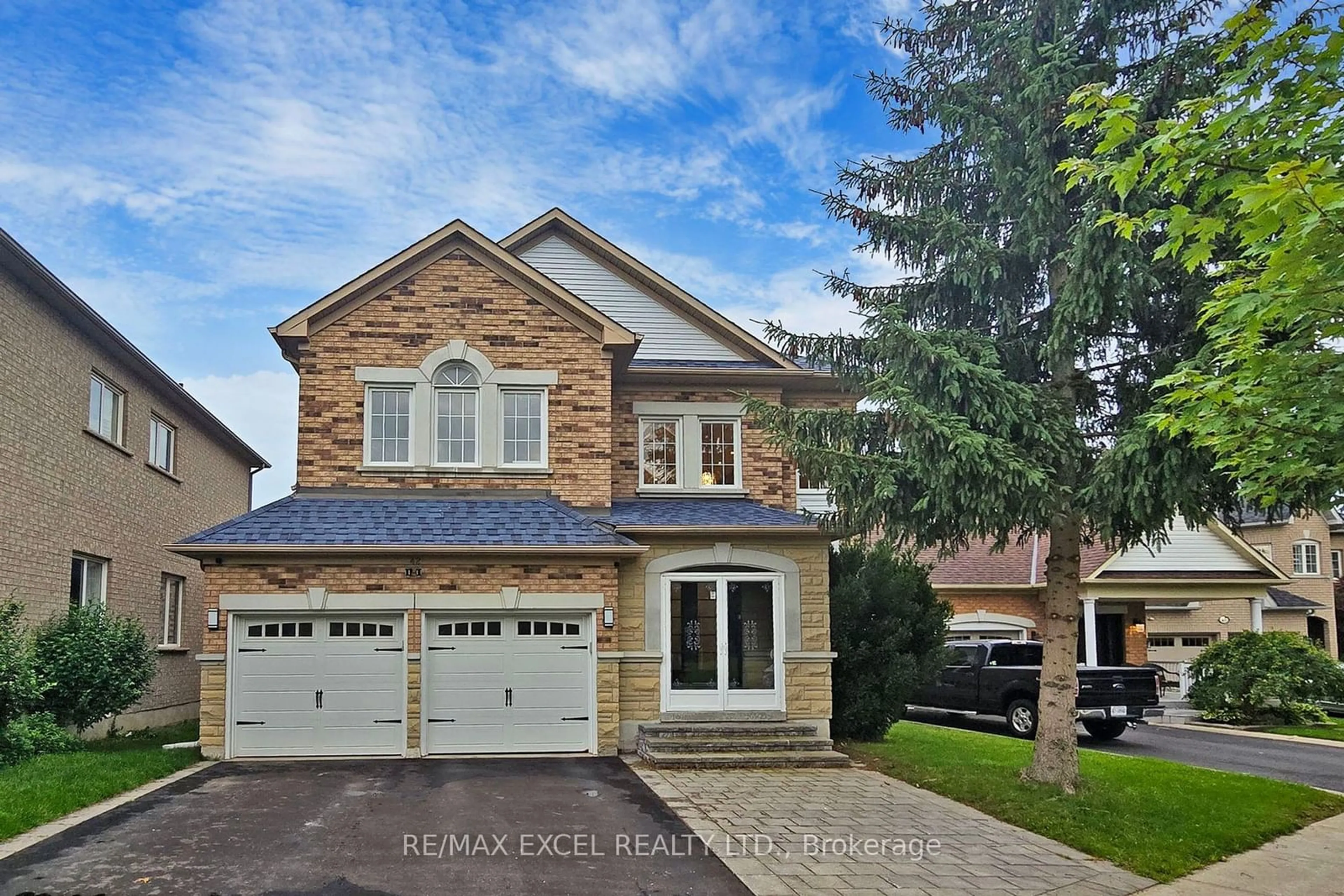 Home with brick exterior material for 42 Rouge Bank Dr, Markham Ontario L3S 4C7