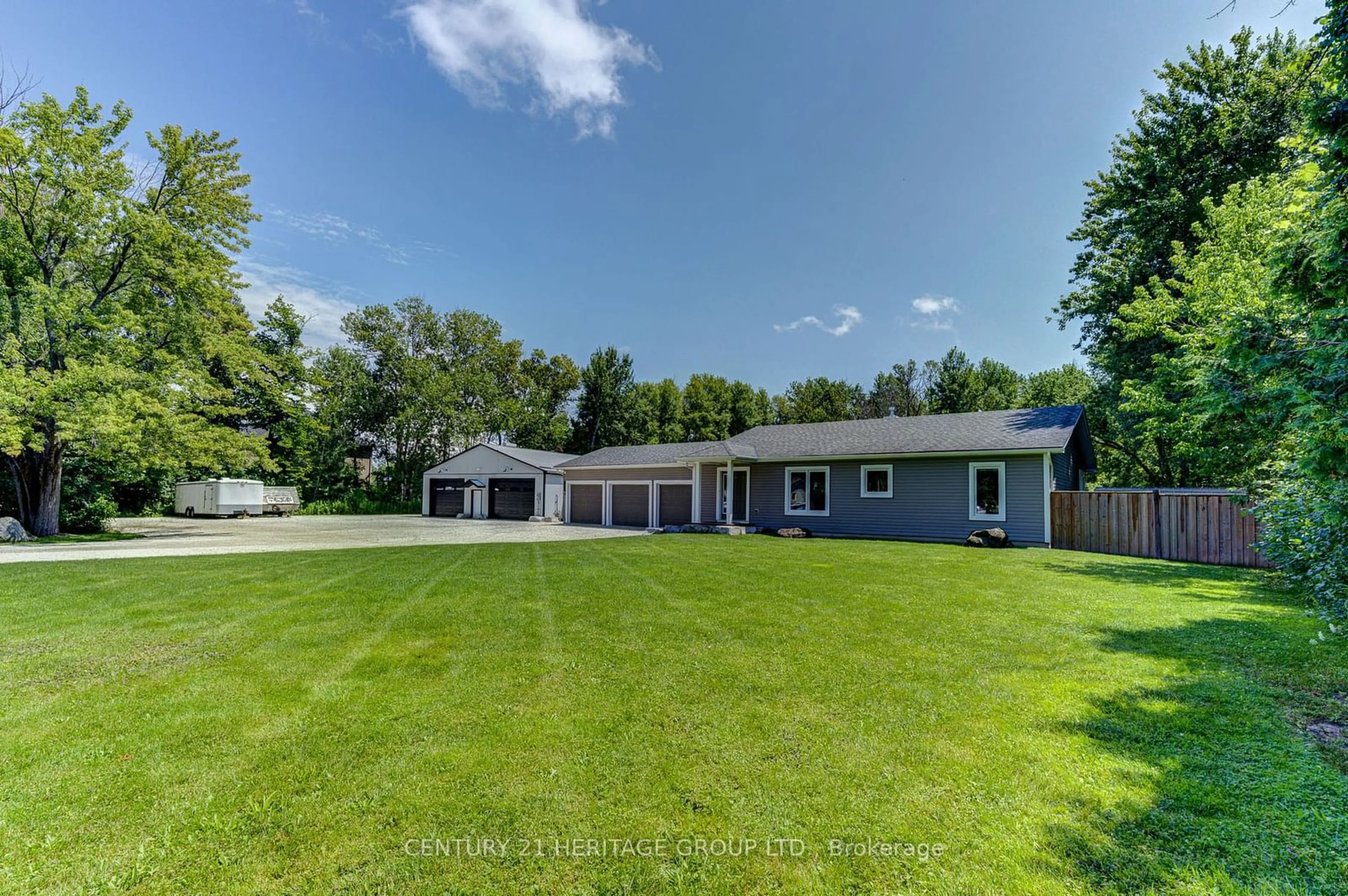 Frontside or backside of a home, the fenced backyard for 1213 Shore Acres Dr, Innisfil Ontario L0L 1R0