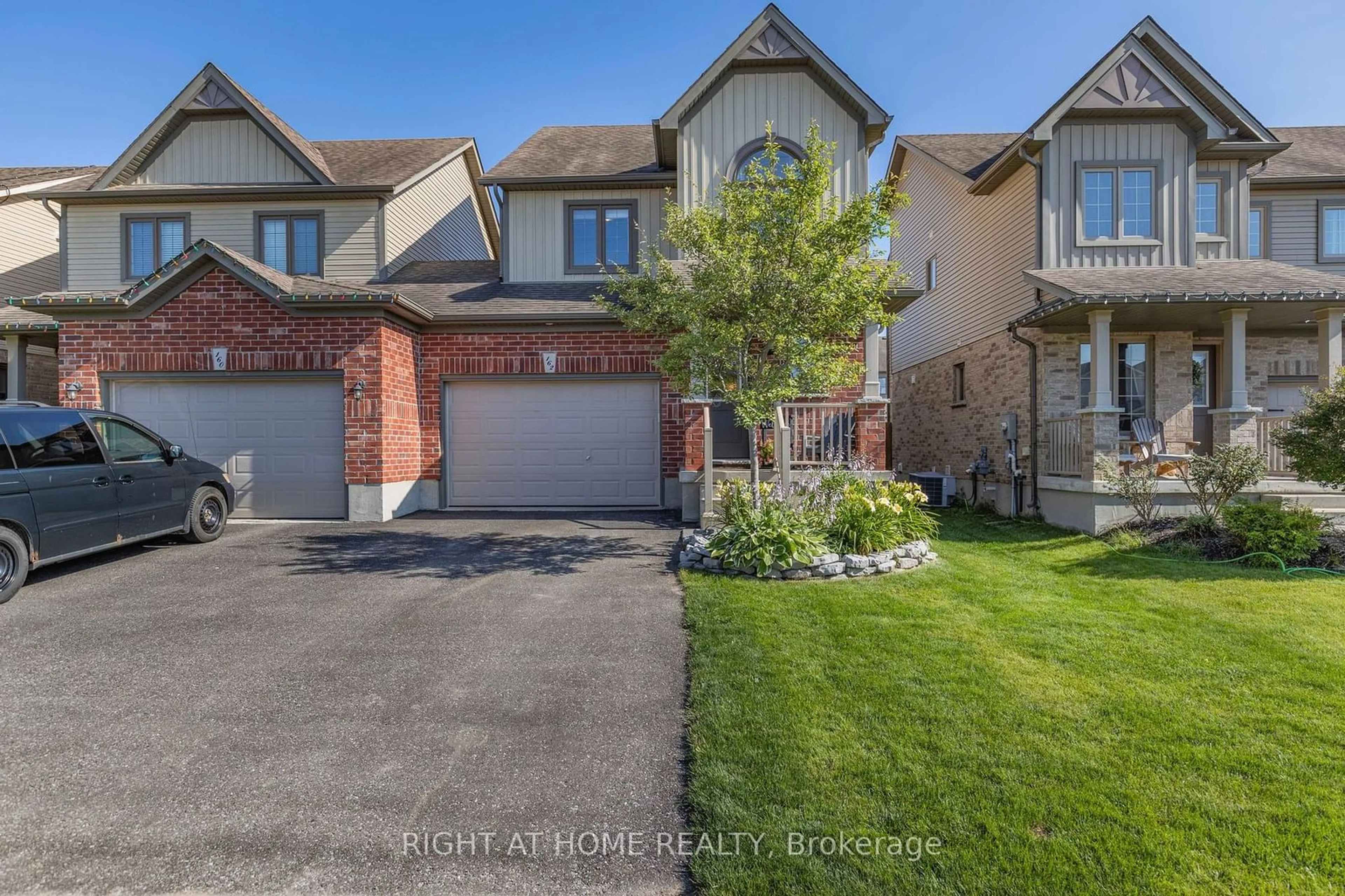 Frontside or backside of a home for 162 Banting Cres, Essa Ontario L0M 1B6