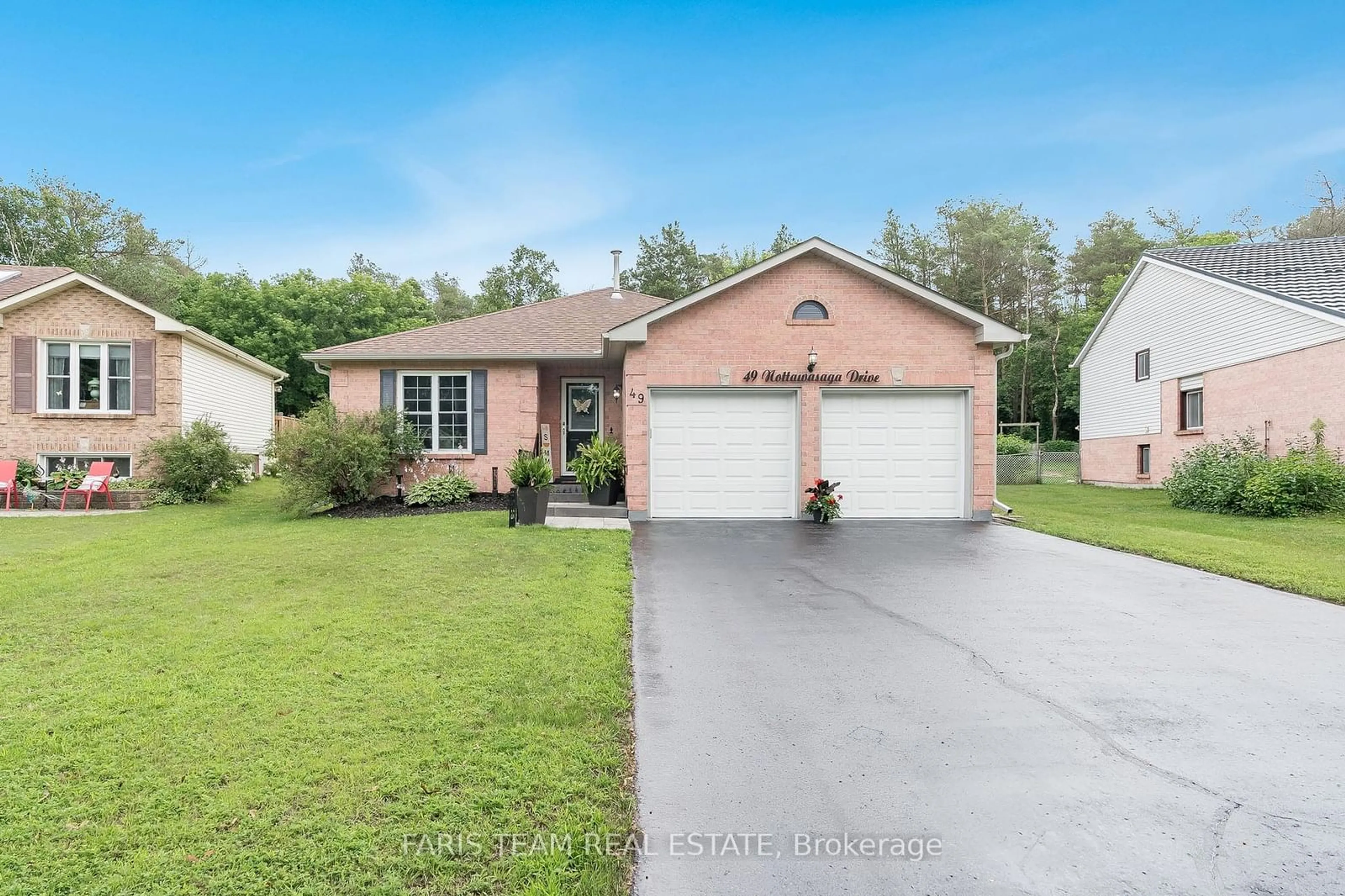 Frontside or backside of a home for 49 Nottawasaga Dr, Essa Ontario L0M 1B0