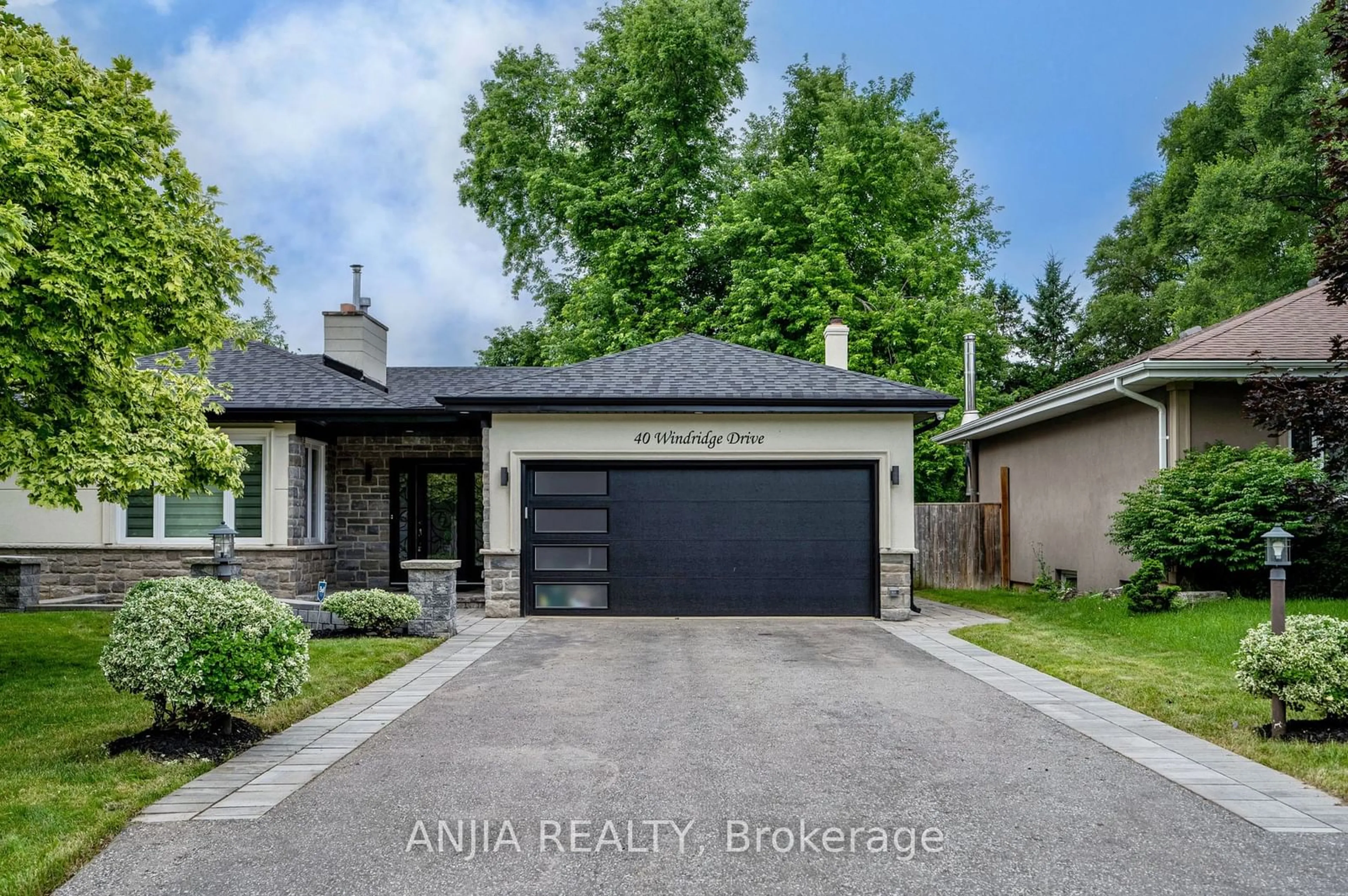 Frontside or backside of a home for 40 Windridge Dr, Markham Ontario L3P 1V1