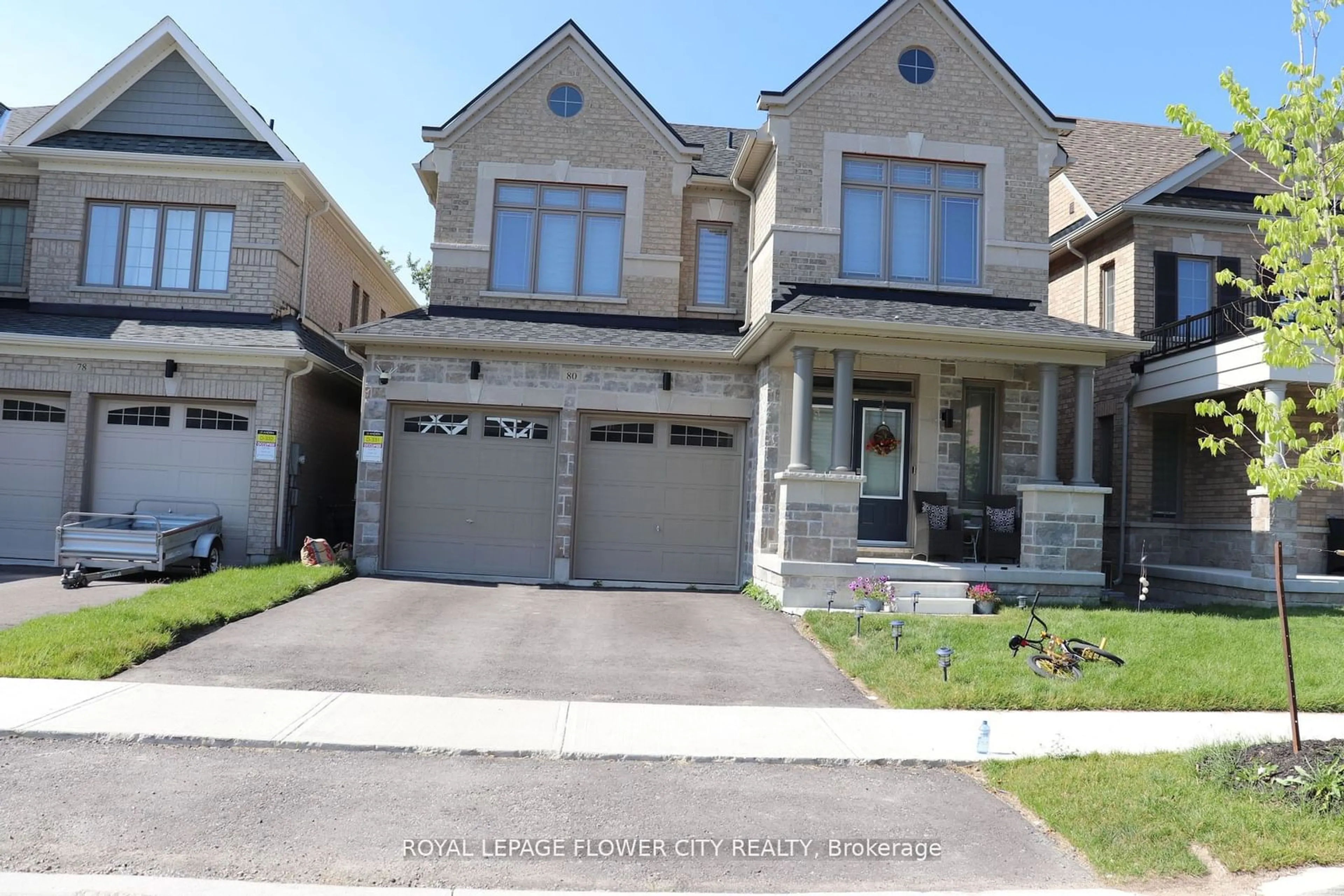 Frontside or backside of a home for 80 Marlene Johnston Dr, East Gwillimbury Ontario L9N 0X1