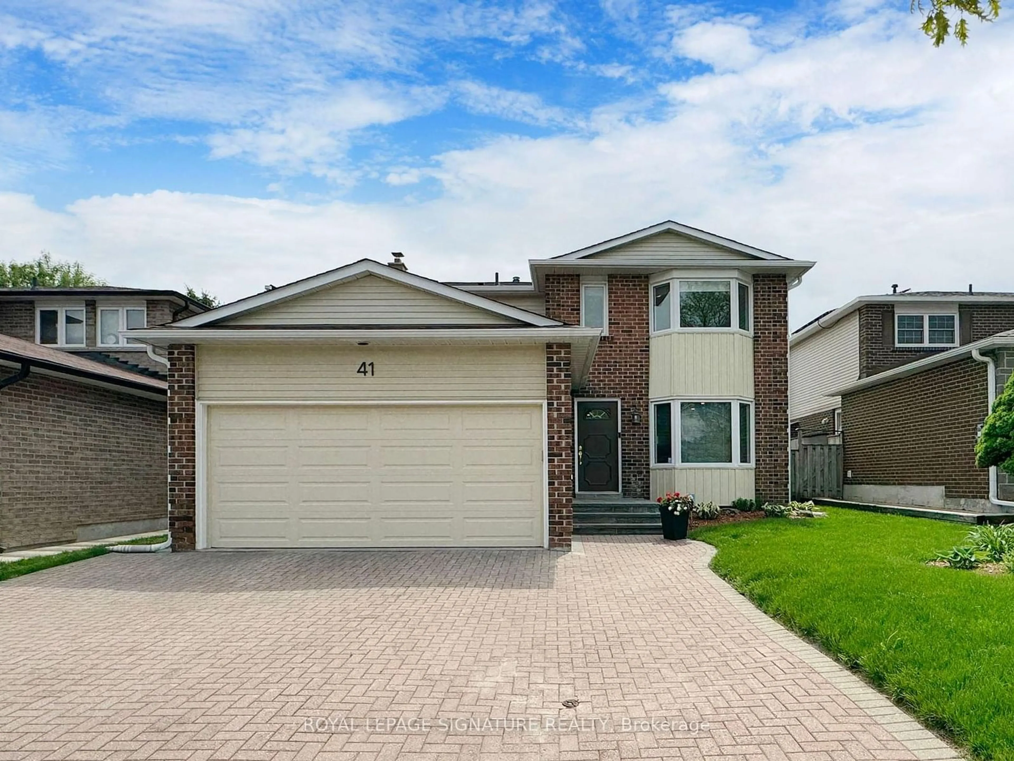 Home with brick exterior material for 41 Livingstone Rd, Markham Ontario L3T 7B6