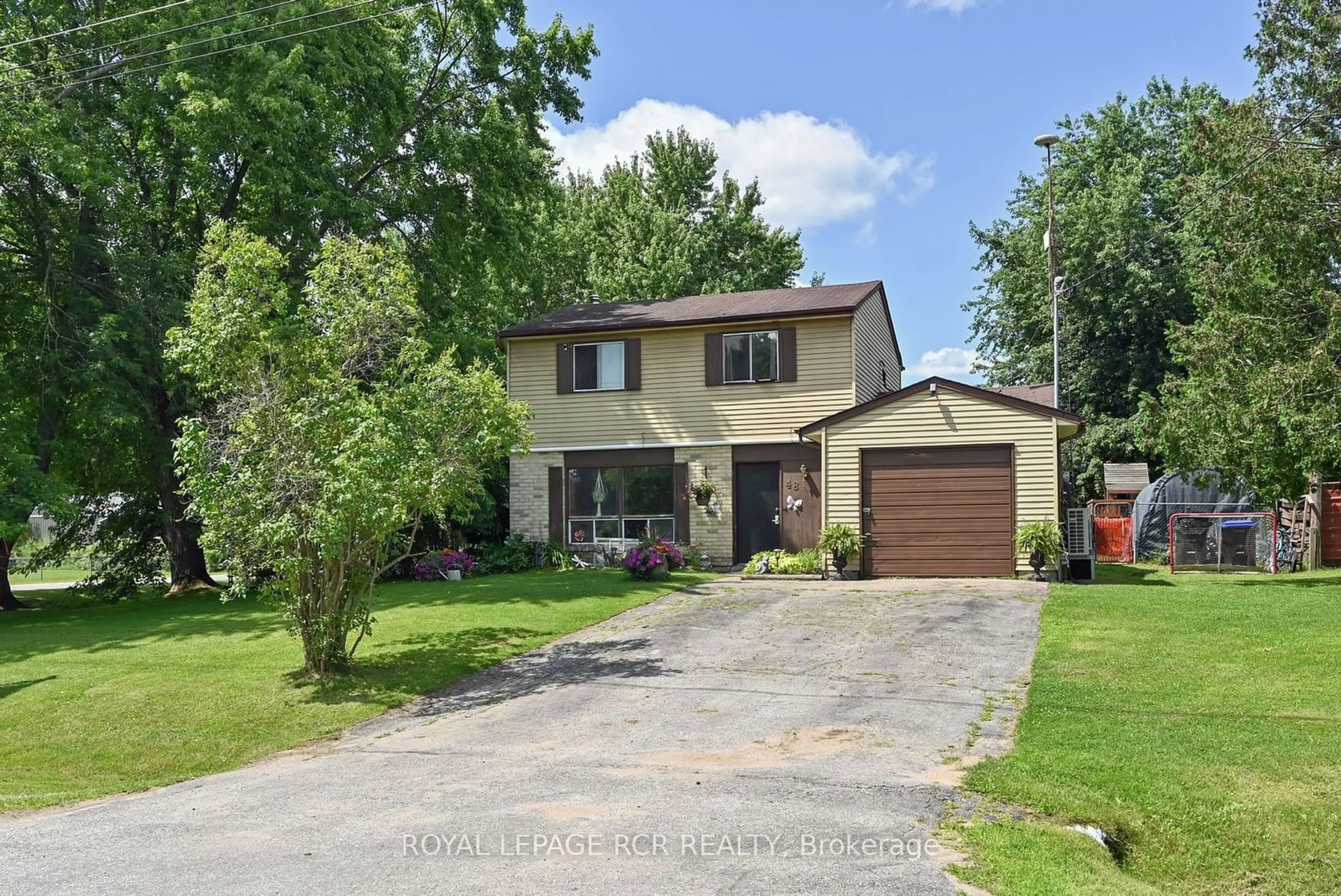 Frontside or backside of a home for 48 Market St, Adjala-Tosorontio Ontario L0M 1M0