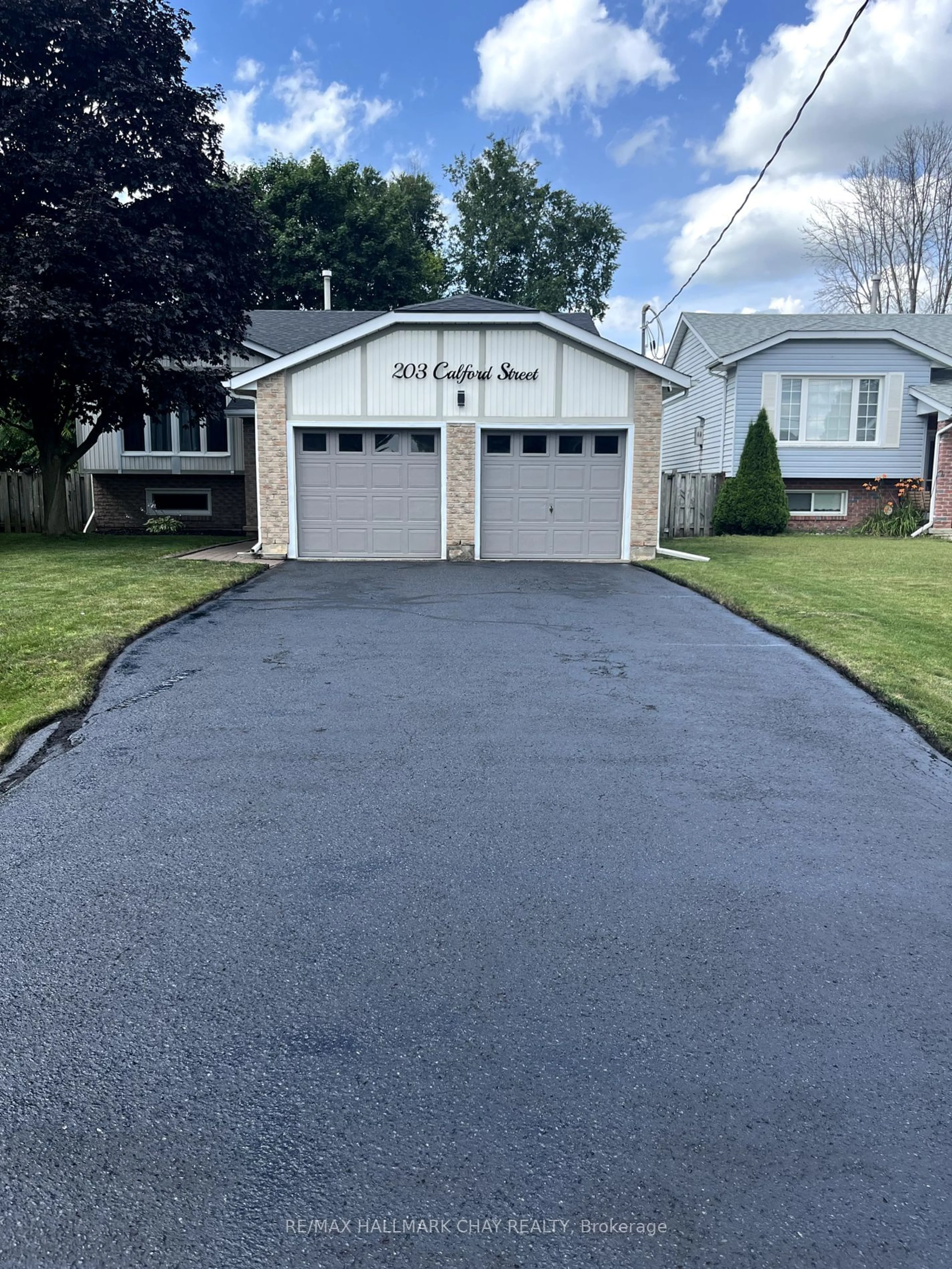 Frontside or backside of a home for 203 Calford St, Essa Ontario L0M 1B0