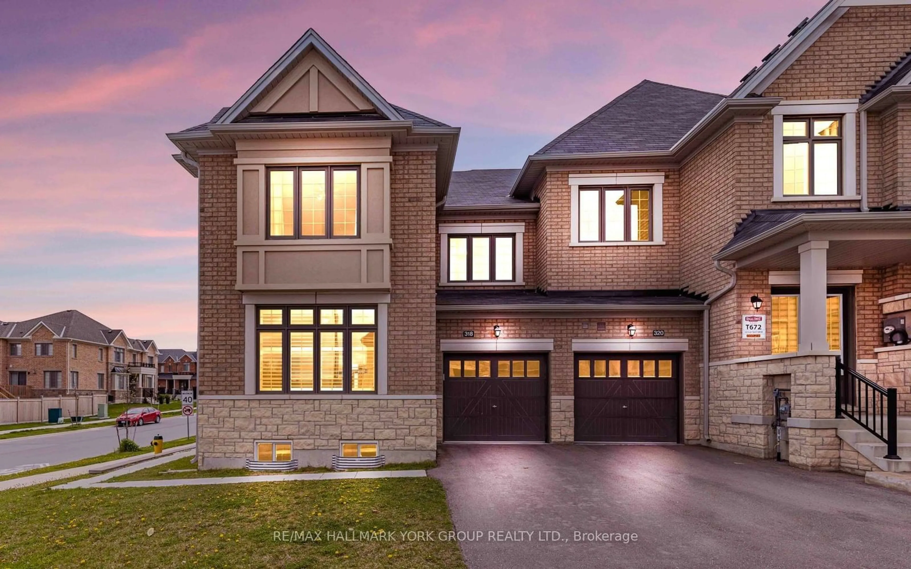 Home with brick exterior material for 318 Silk Twist Dr, East Gwillimbury Ontario L9N 0V4