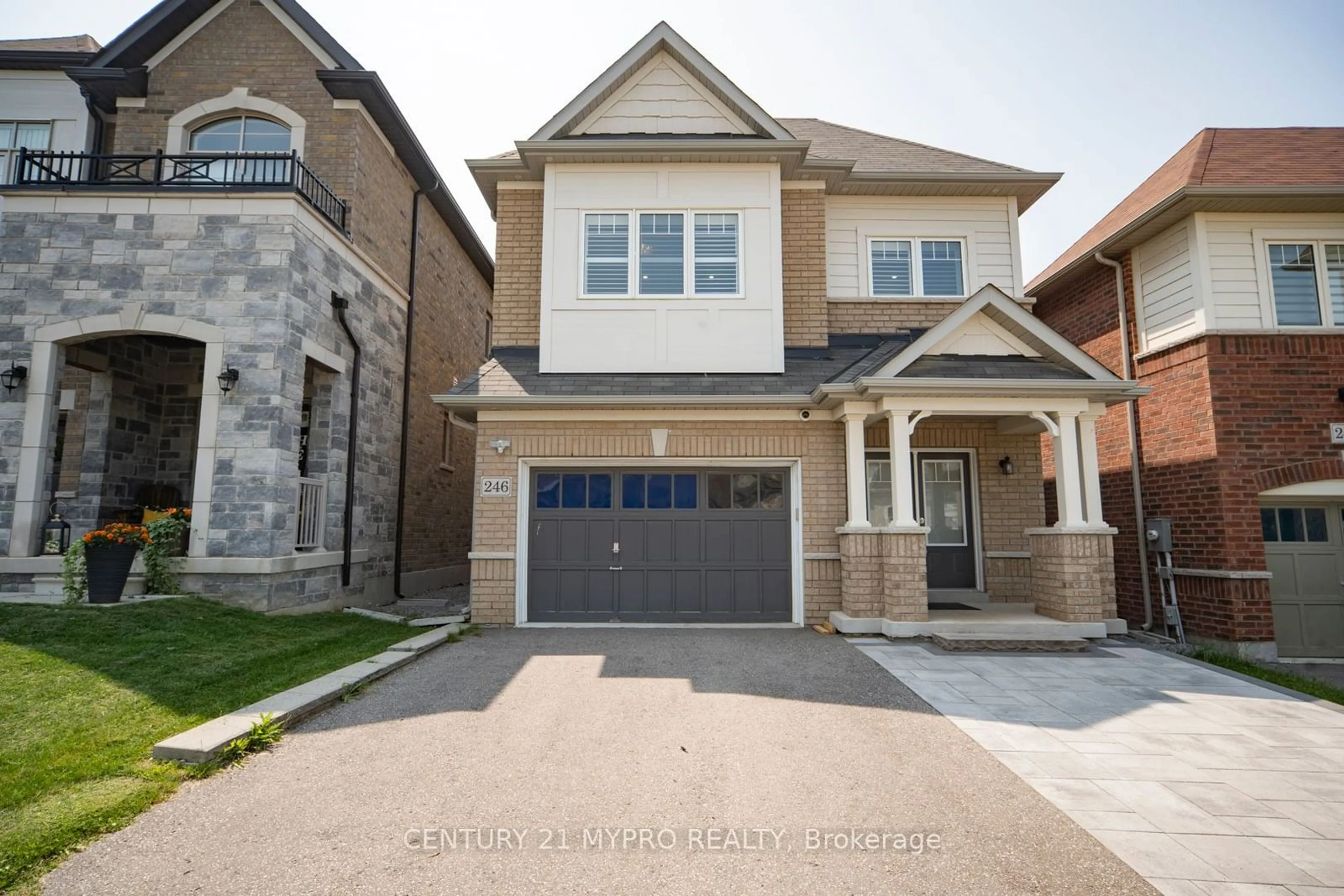 Home with brick exterior material for 246 Sharon Creek Dr, East Gwillimbury Ontario L9N 0P5
