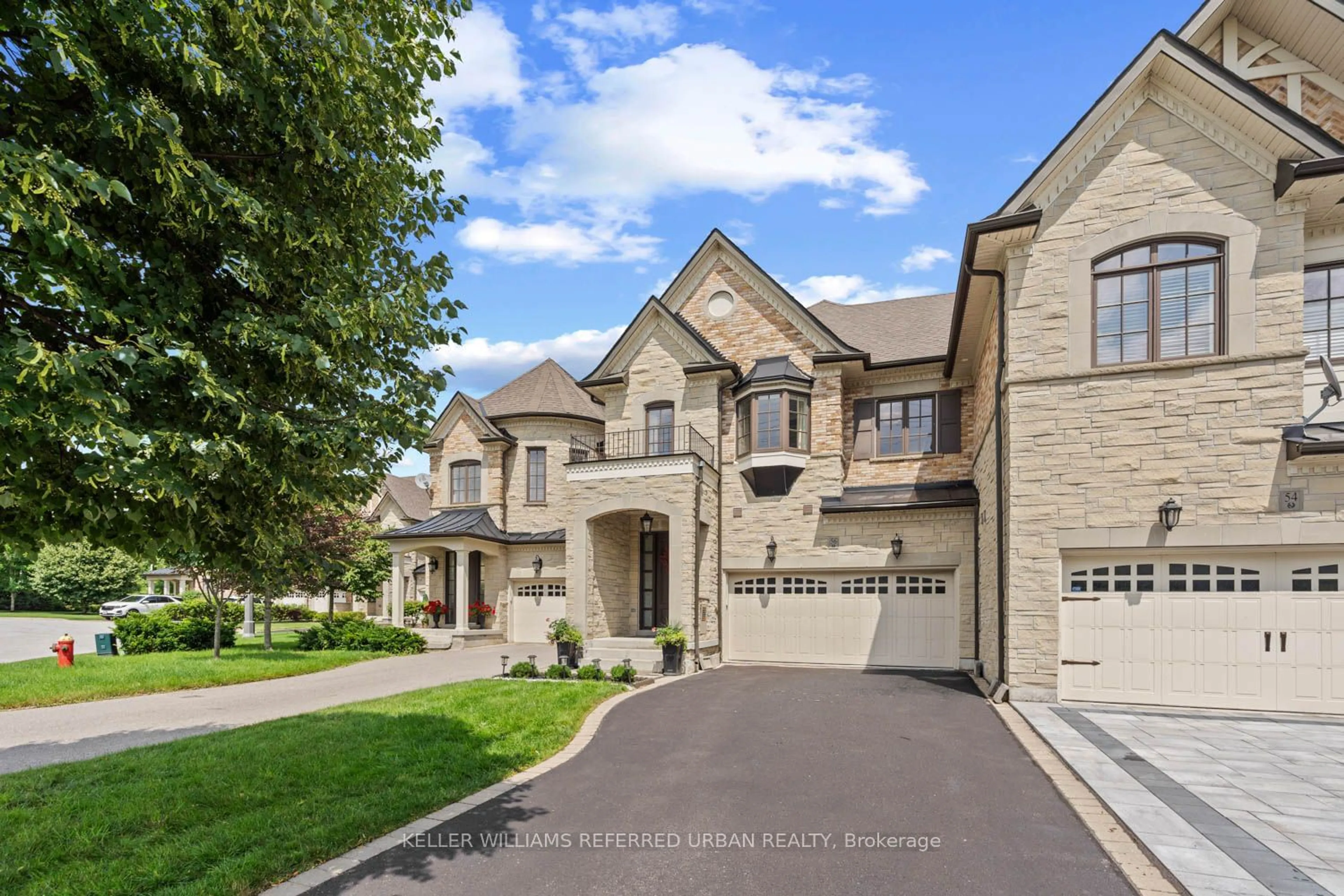 A pic from exterior of the house or condo for 56 Jenny Thompson Crt, Richmond Hill Ontario L4S 0E7