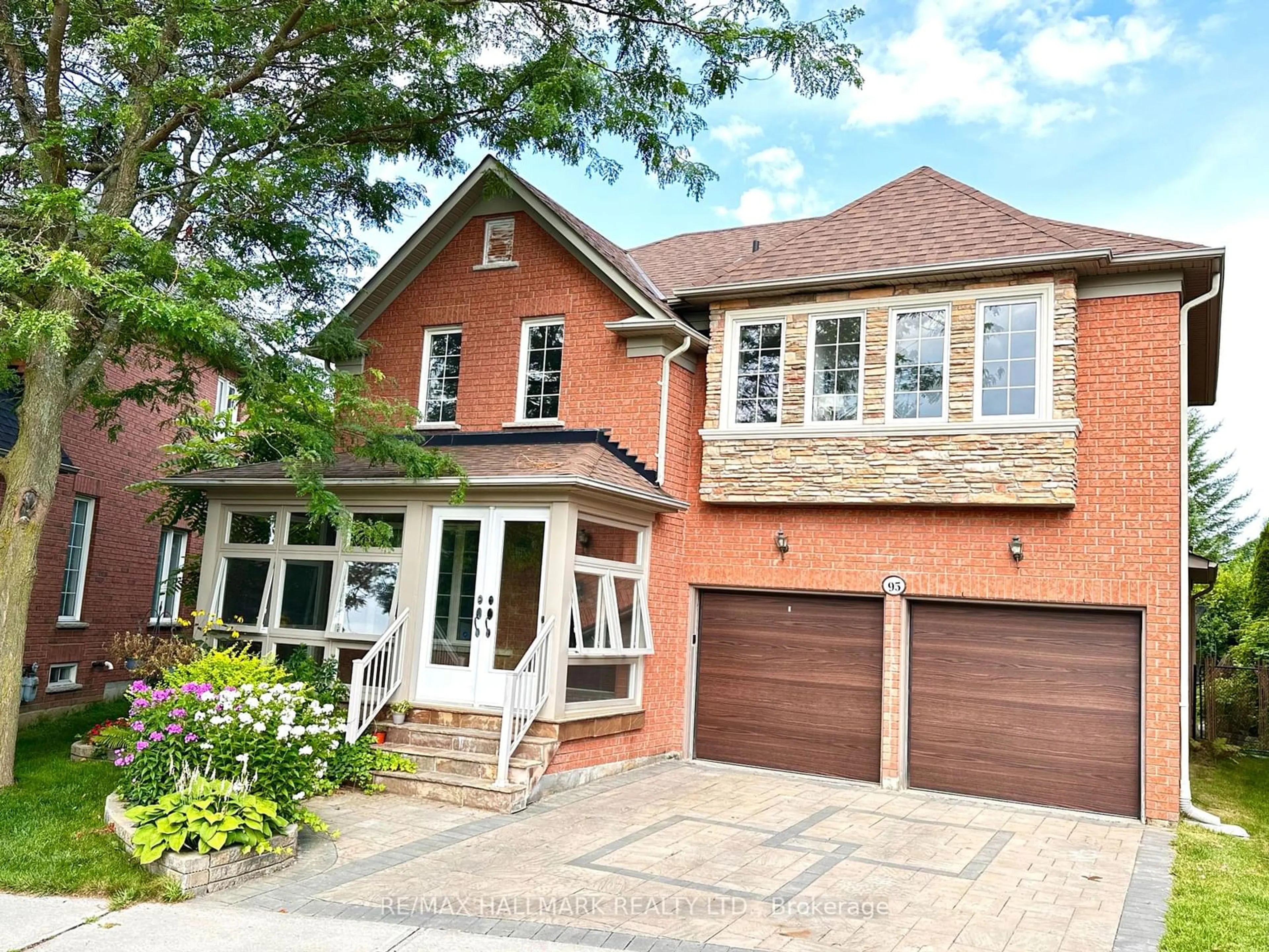 Home with brick exterior material for 95 Greenbank Dr, Richmond Hill Ontario L4E 4C7