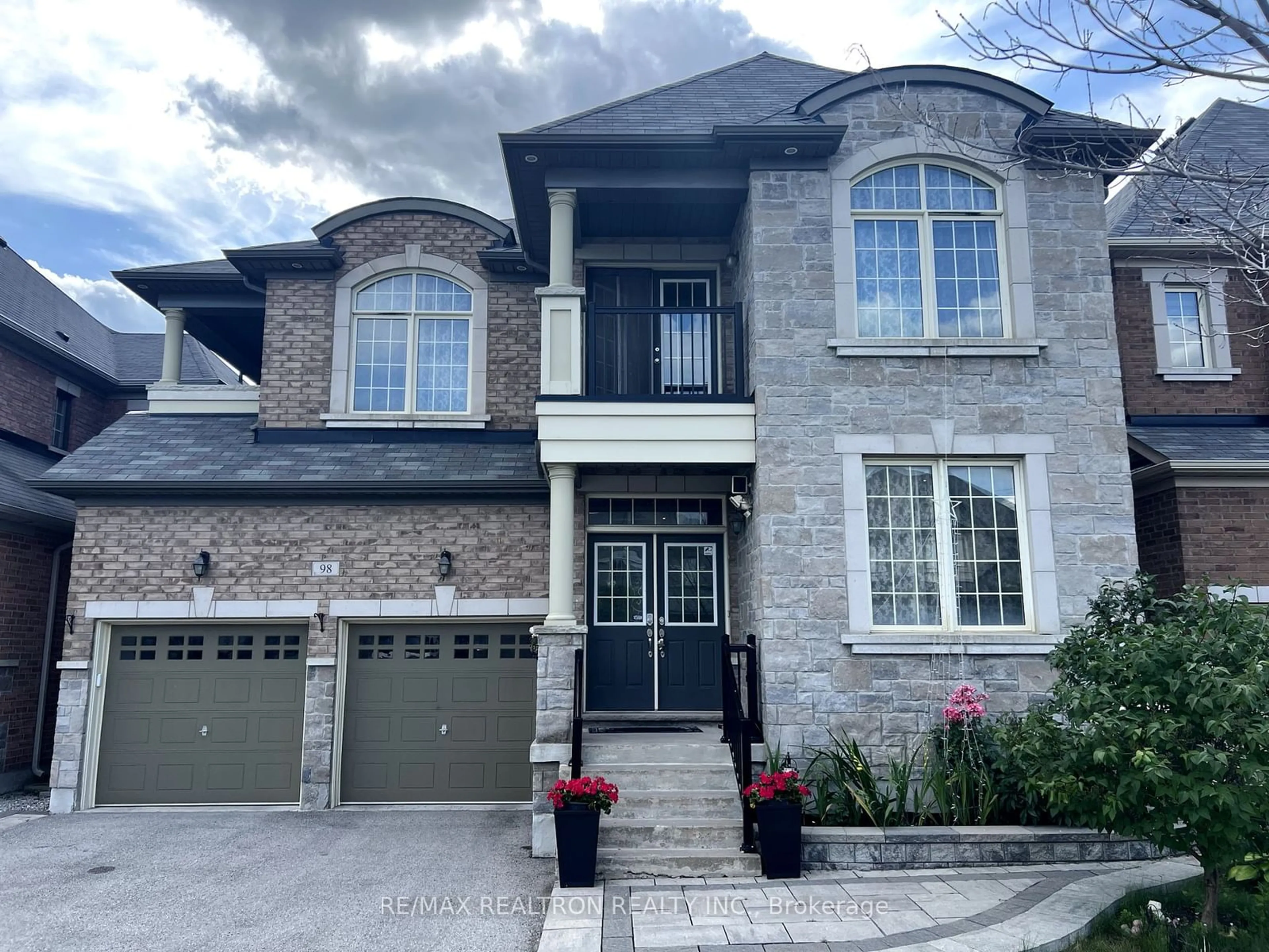 Home with brick exterior material for 98 Greenspire Ave, Markham Ontario L6E 0S2