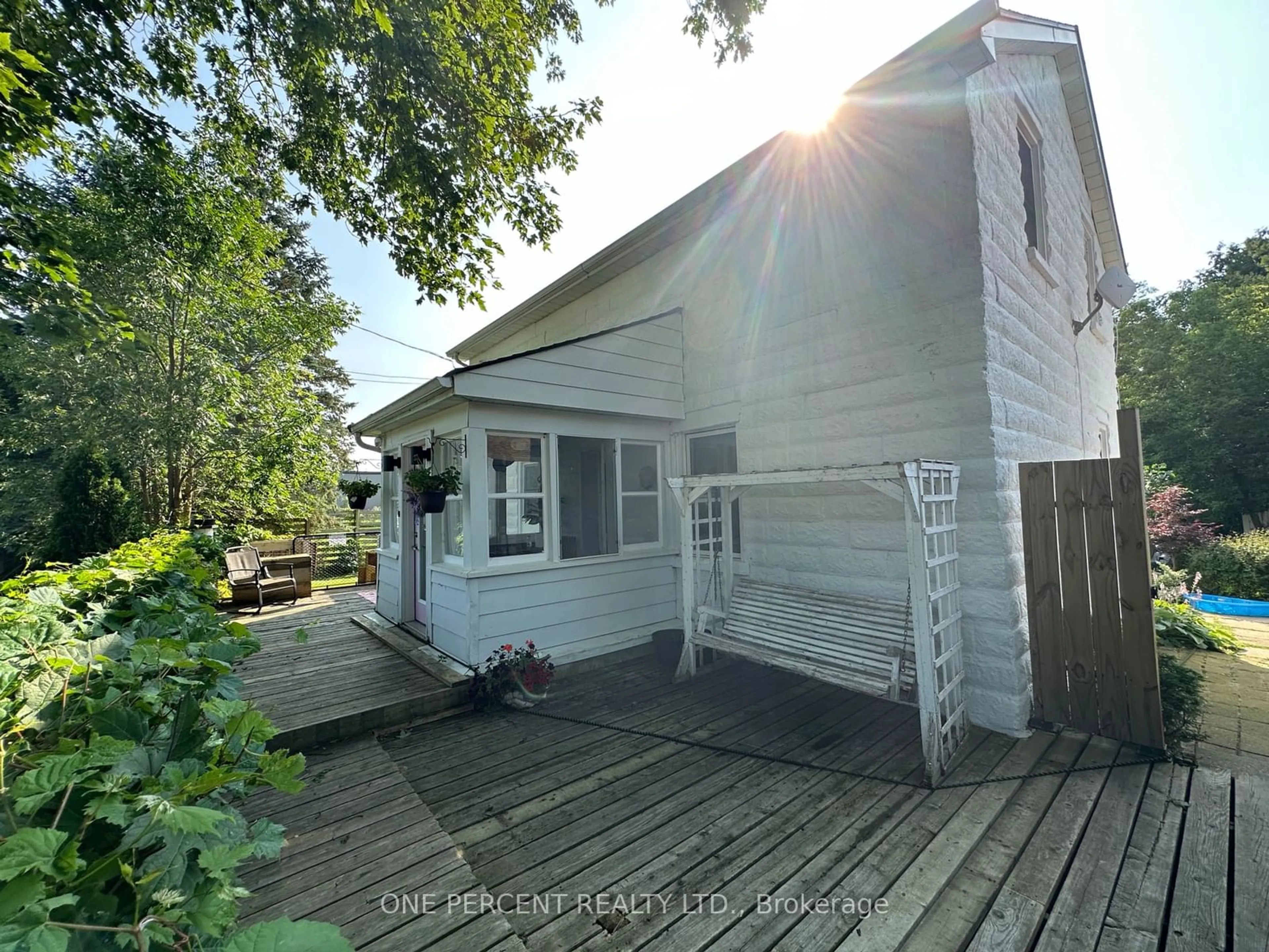 Frontside or backside of a home for 100 Dayfoot St, New Tecumseth Ontario L0G 1A0