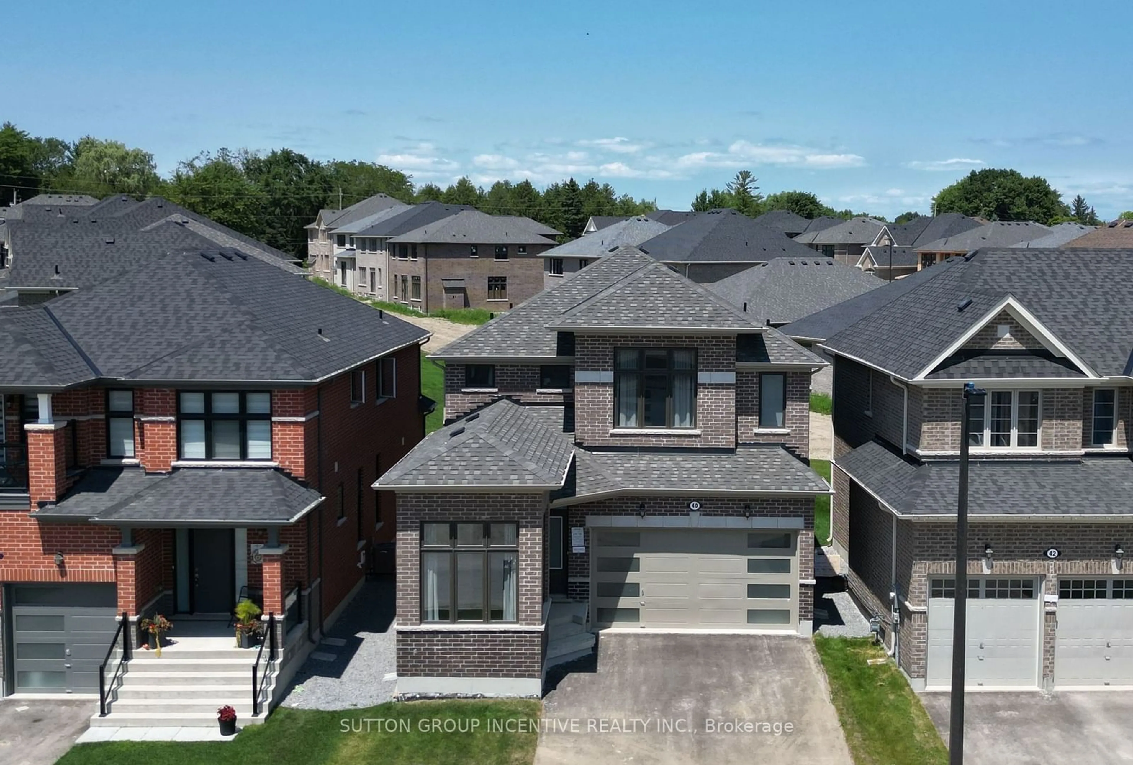 Frontside or backside of a home, the street view for 40 Big Canoe Dr, Georgina Ontario L0E 1R0