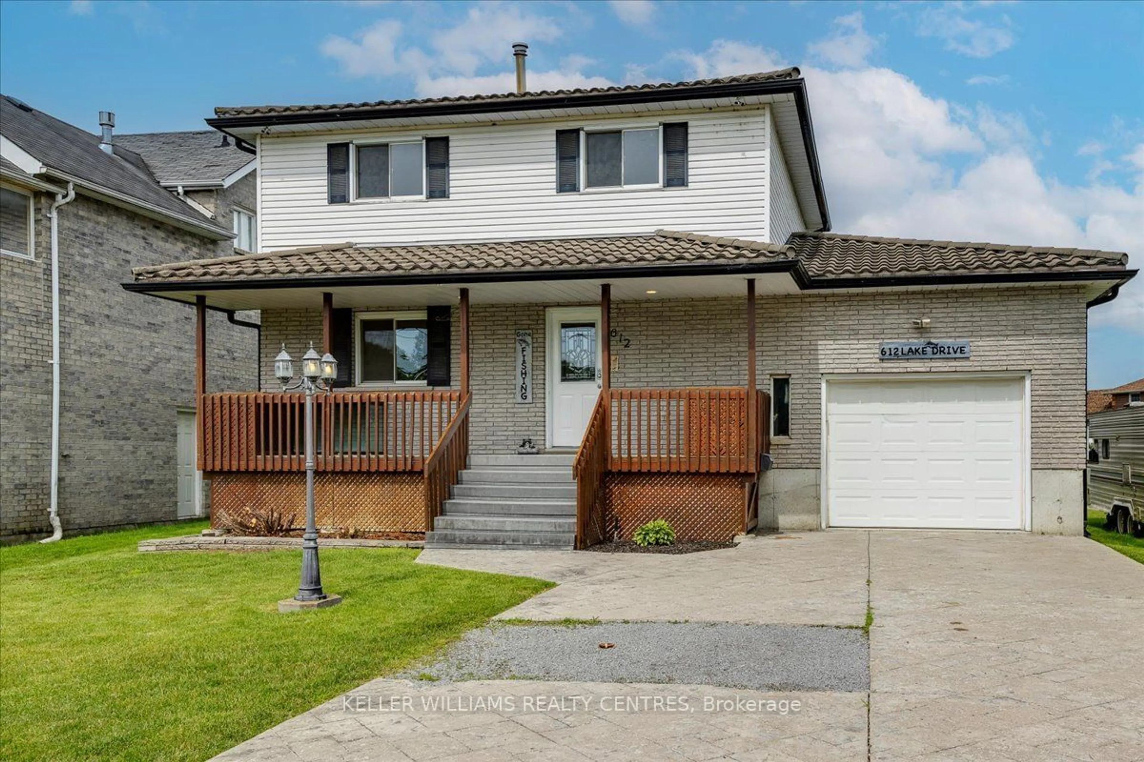 Frontside or backside of a home for 612 Lake Dr, Georgina Ontario L4P 1T5