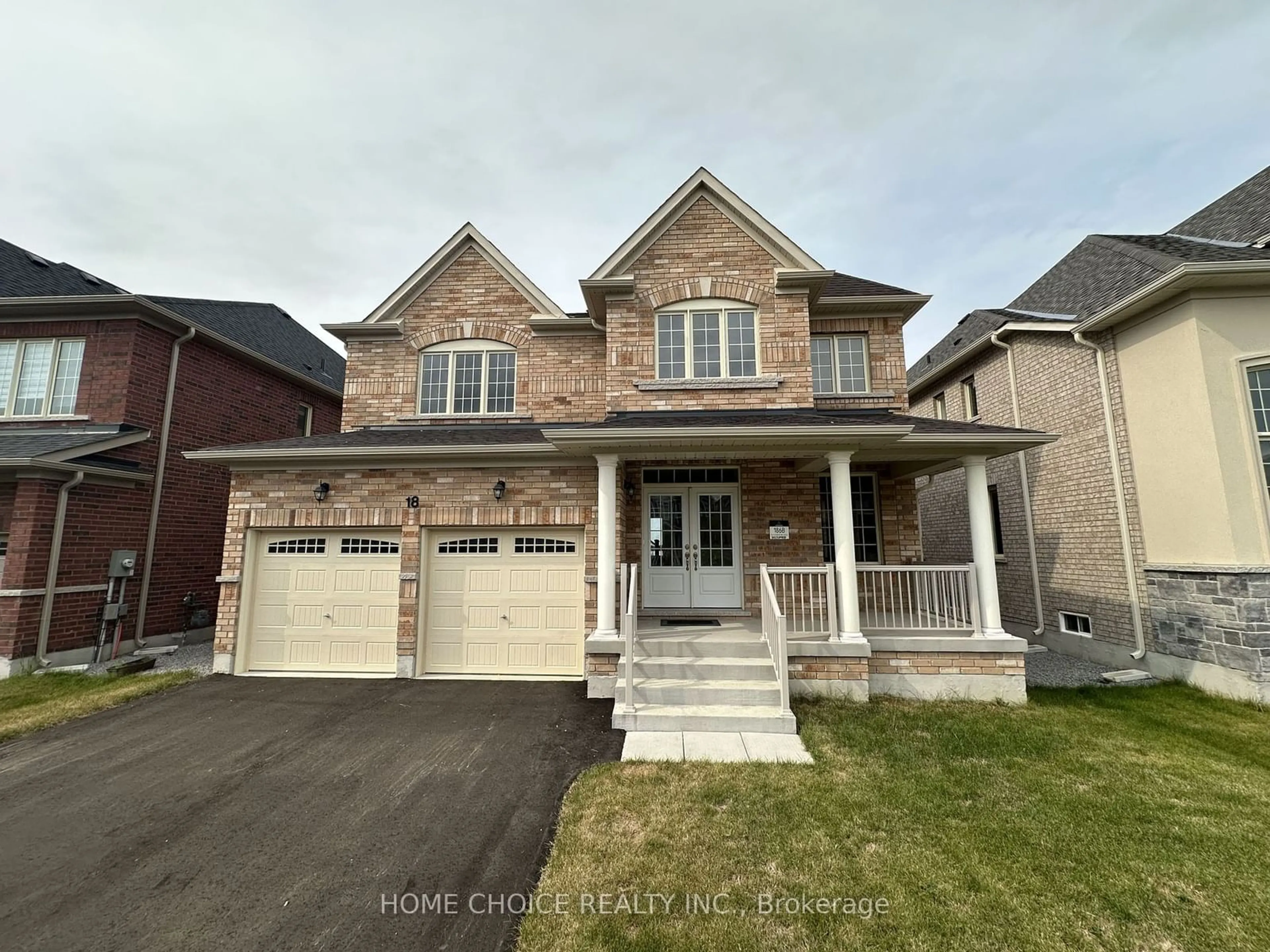 Frontside or backside of a home for 18 Father Muckle Ave, Georgina Ontario L4P 0S4