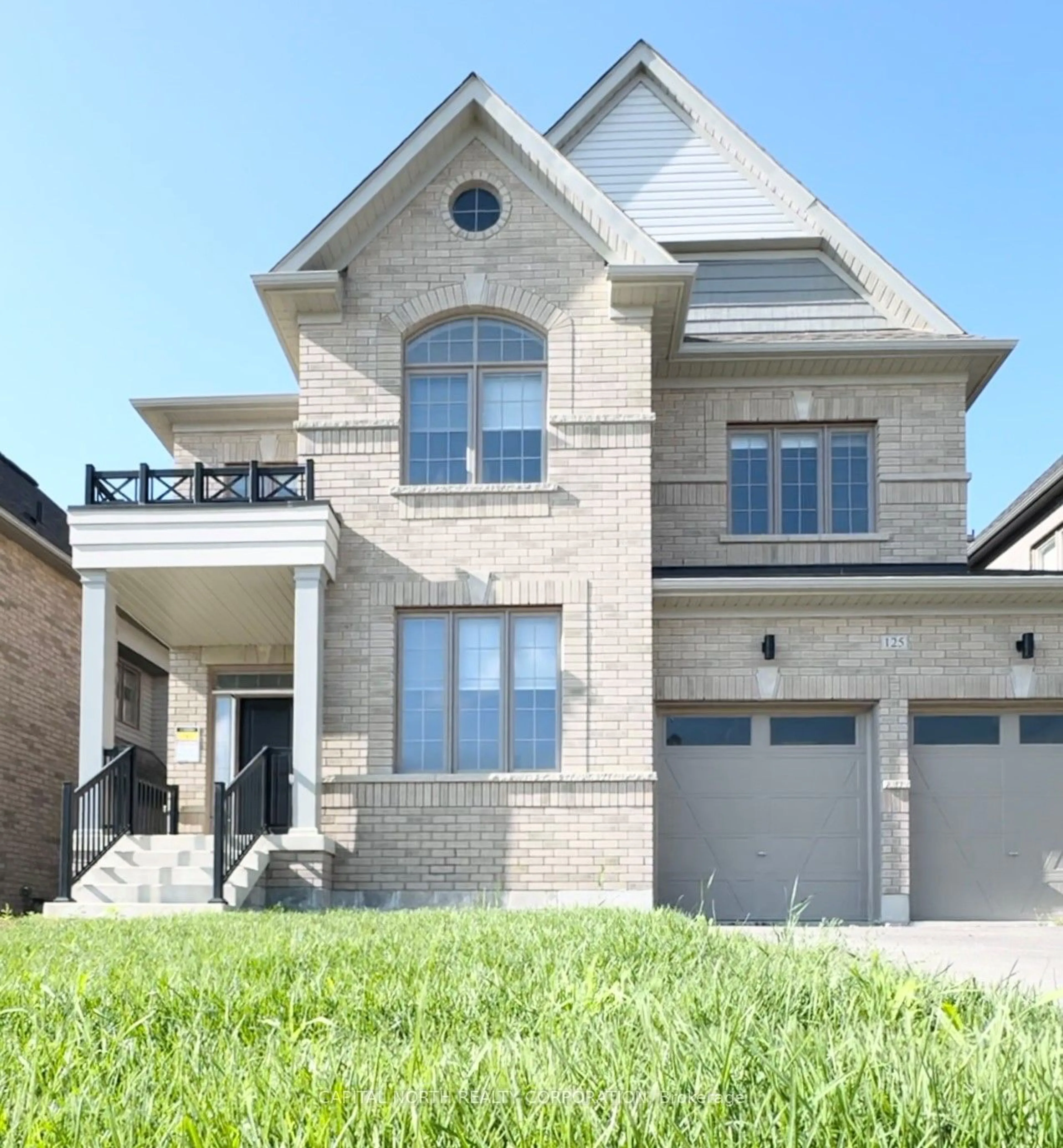 Home with brick exterior material for 125 Silk Twist Dr, East Gwillimbury Ontario L9N 0E5