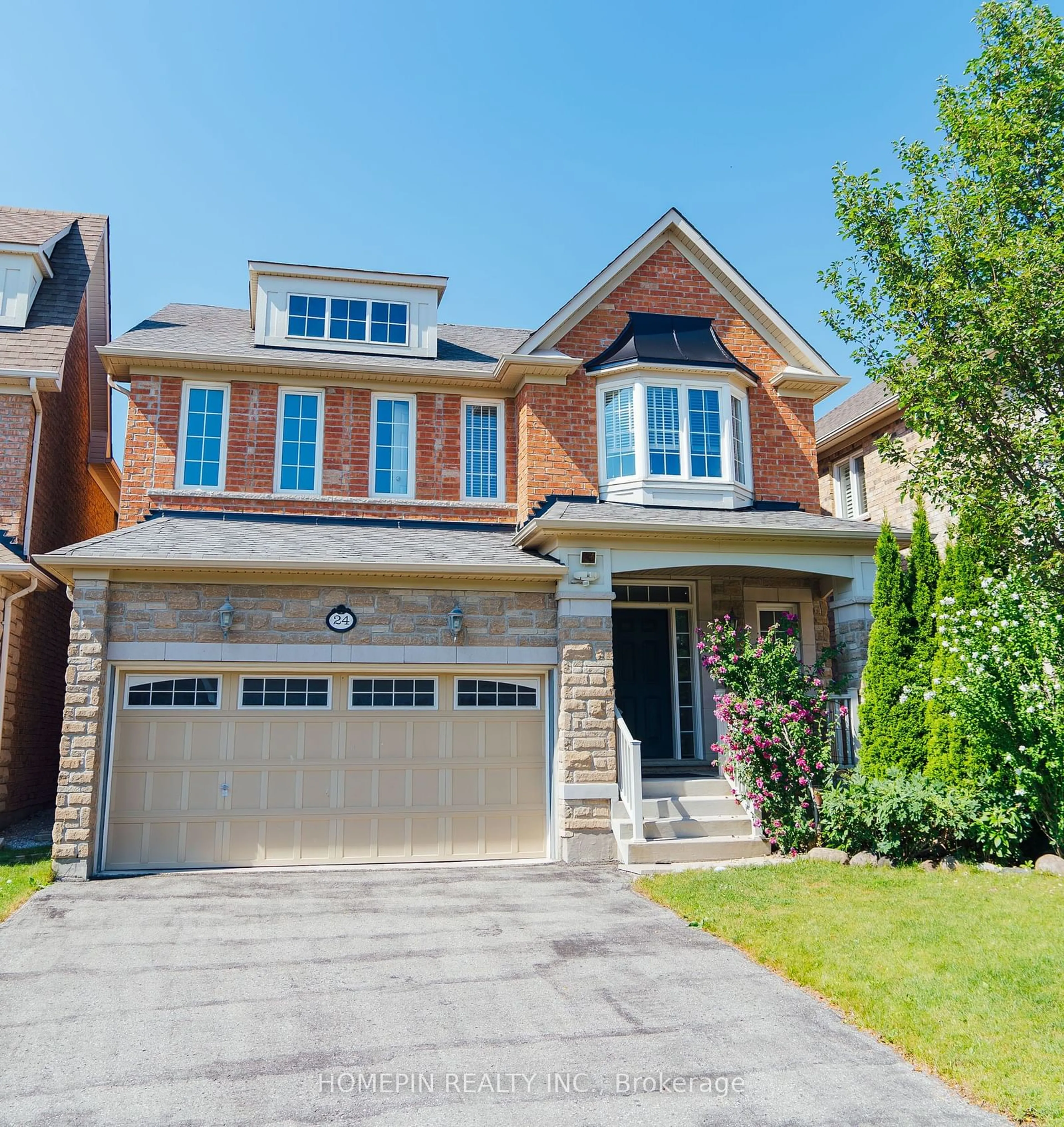 Home with brick exterior material for 24 James Joyce Dr, Markham Ontario L6C 0L7