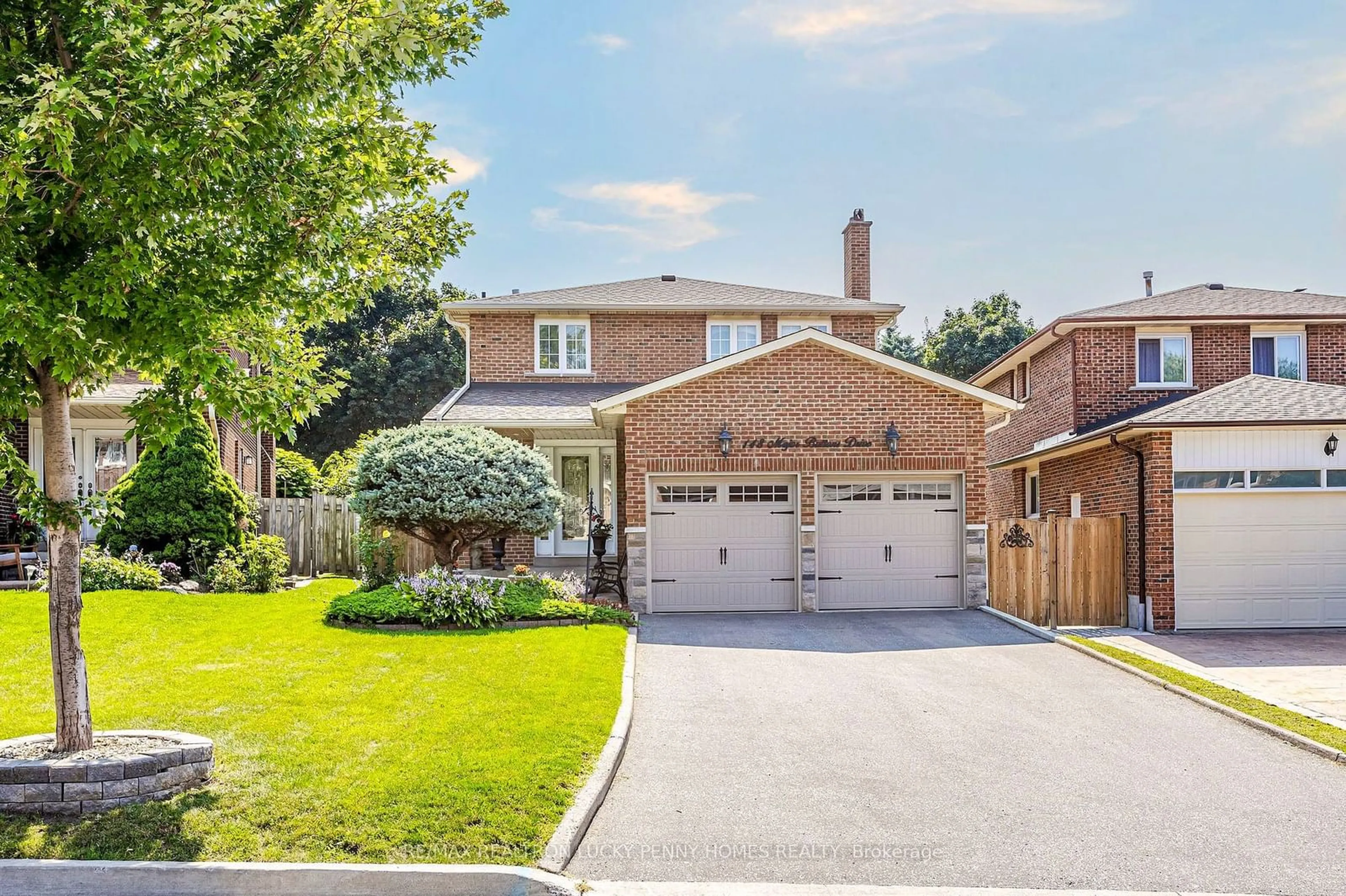 Frontside or backside of a home, the street view for 148 Major Buttons Dr, Markham Ontario L3P 3X6