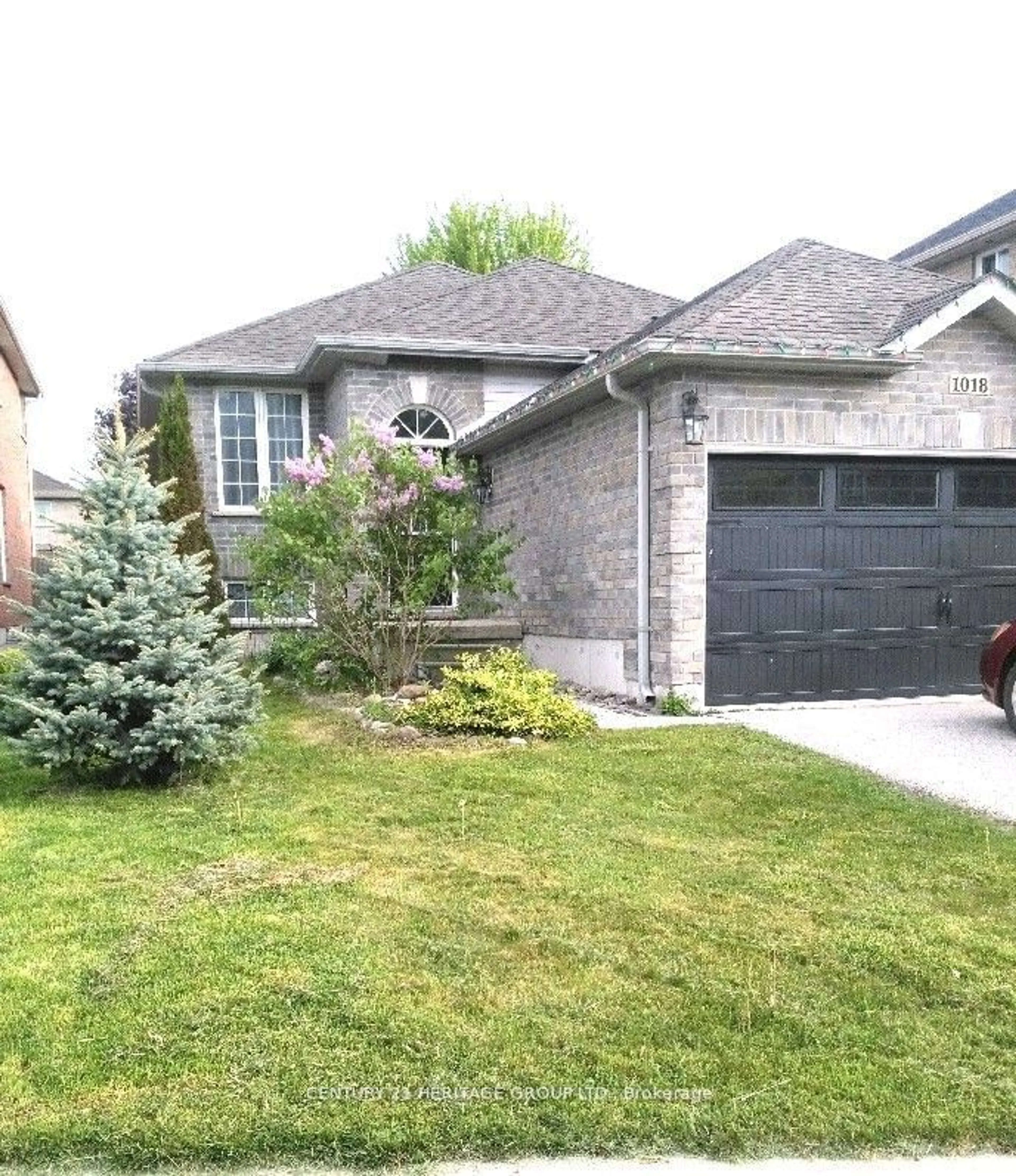 Frontside or backside of a home, the street view for 1018 Griggs Rd, Innisfil Ontario L9S 0A6