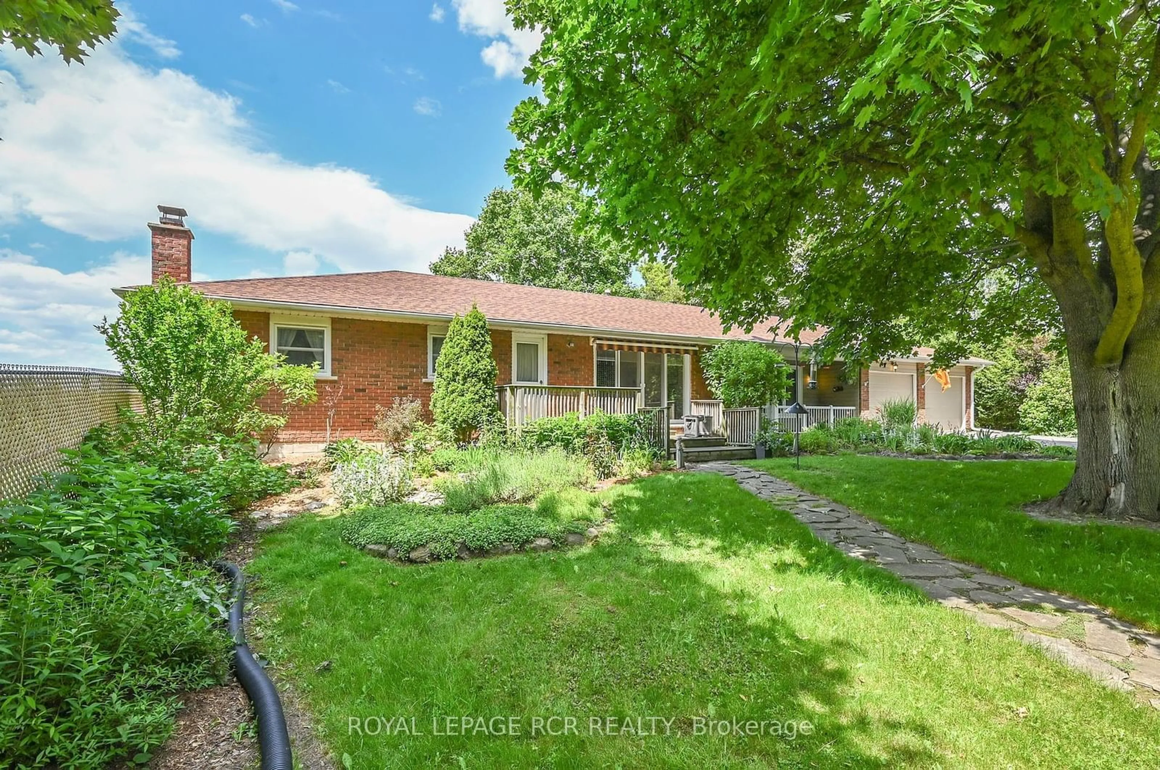 A pic from exterior of the house or condo, the fenced backyard for 6438 9th Line, New Tecumseth Ontario L0G 1A0