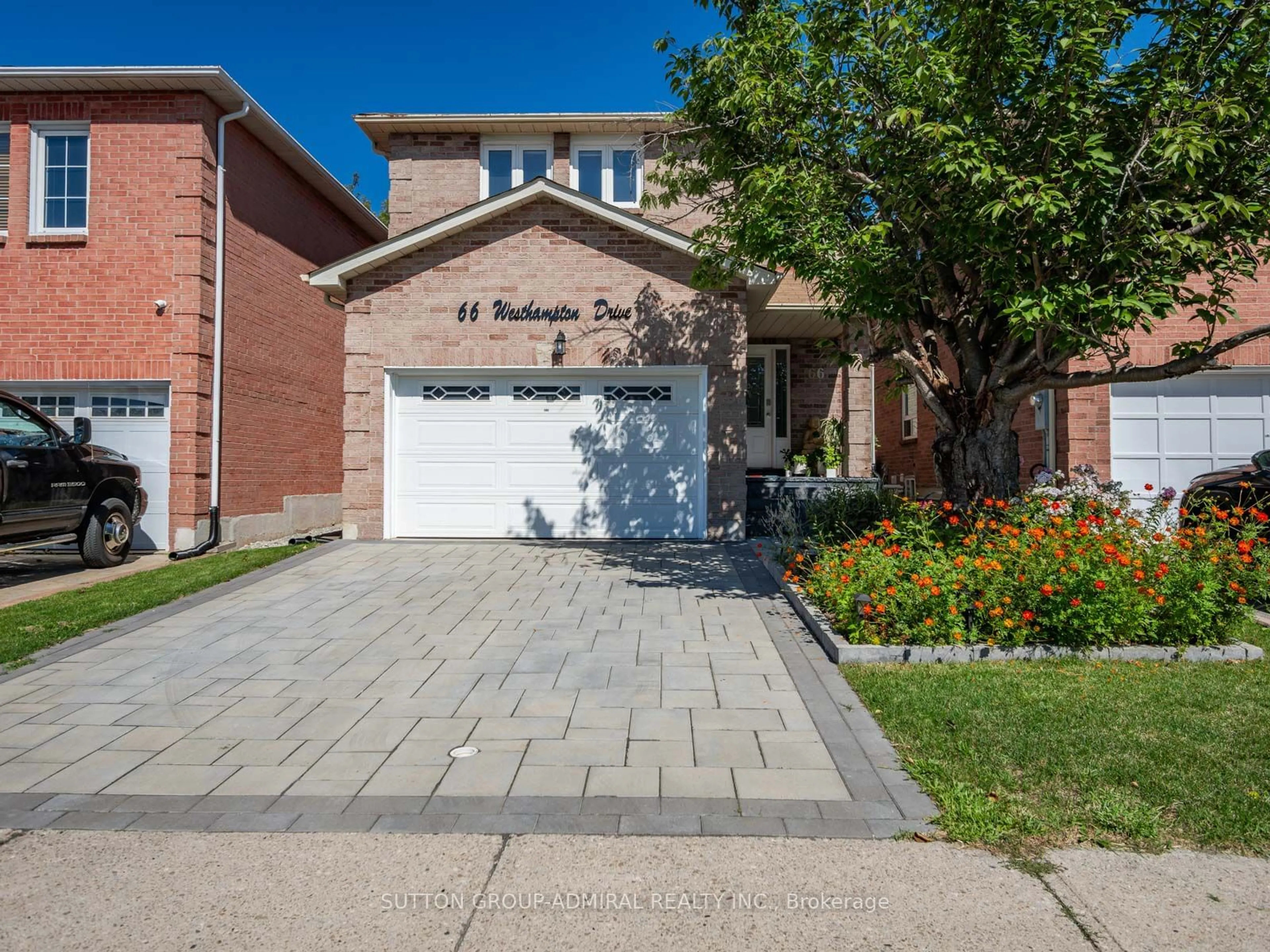 Home with brick exterior material for 66 Westhampton Dr, Vaughan Ontario L4J 7H3