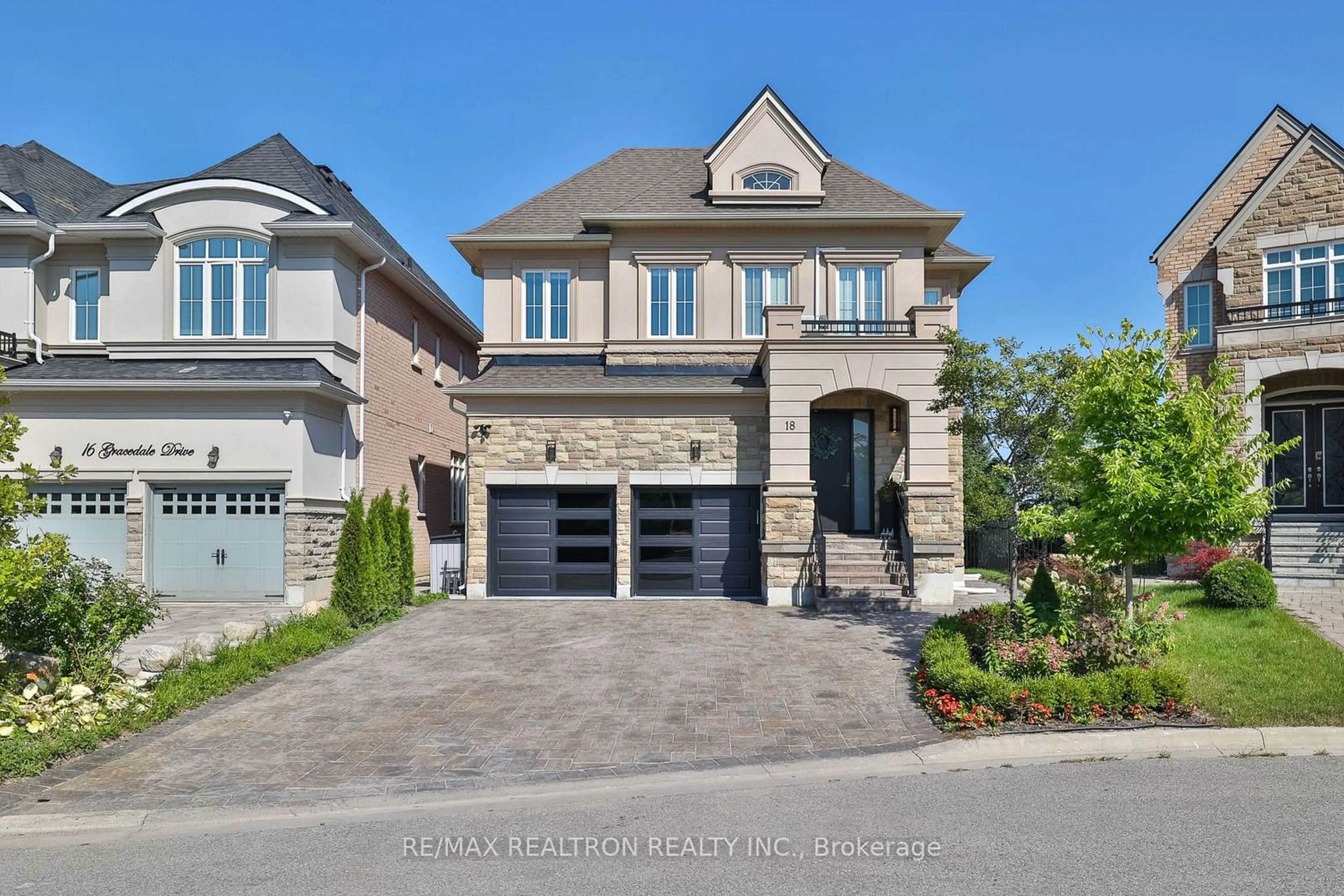 Frontside or backside of a home, the street view for 18 Gracedale Dr, Richmond Hill Ontario L4C 0Y3