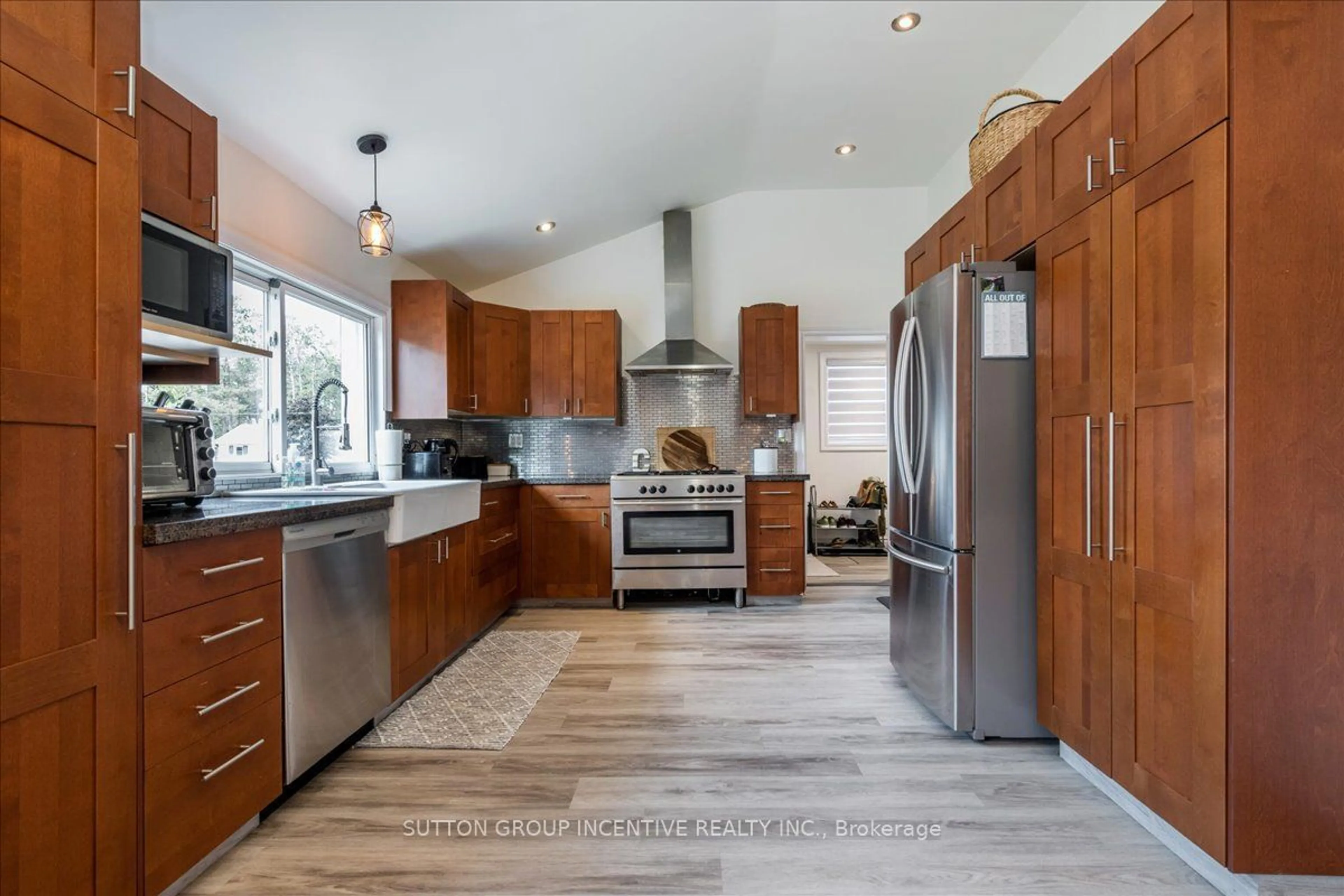 Contemporary kitchen, wood floors for 53 Coulson Ave, Essa Ontario L0M 1B3