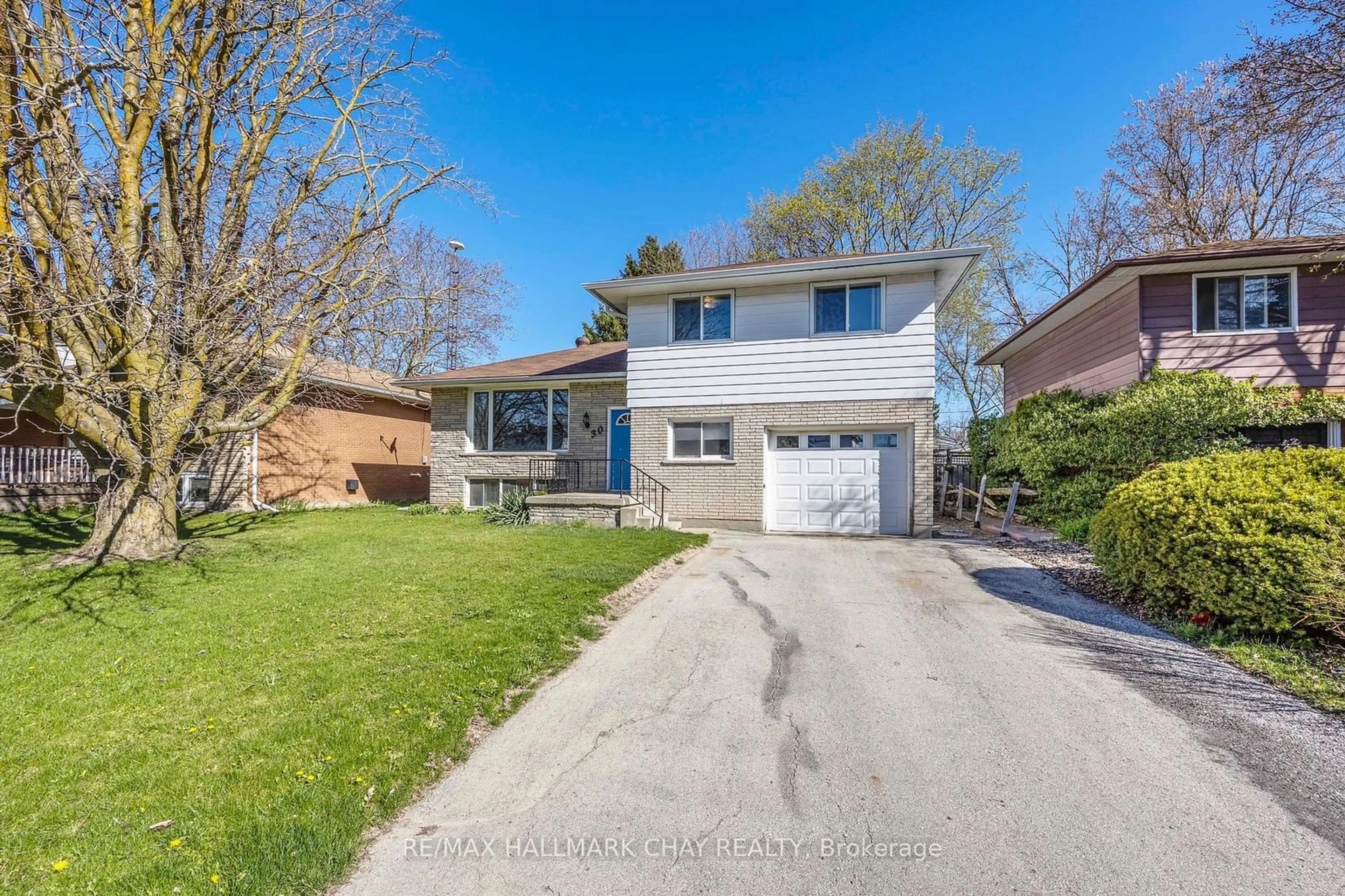 Frontside or backside of a home, the street view for 30 Dillane St, New Tecumseth Ontario L0G 1W0