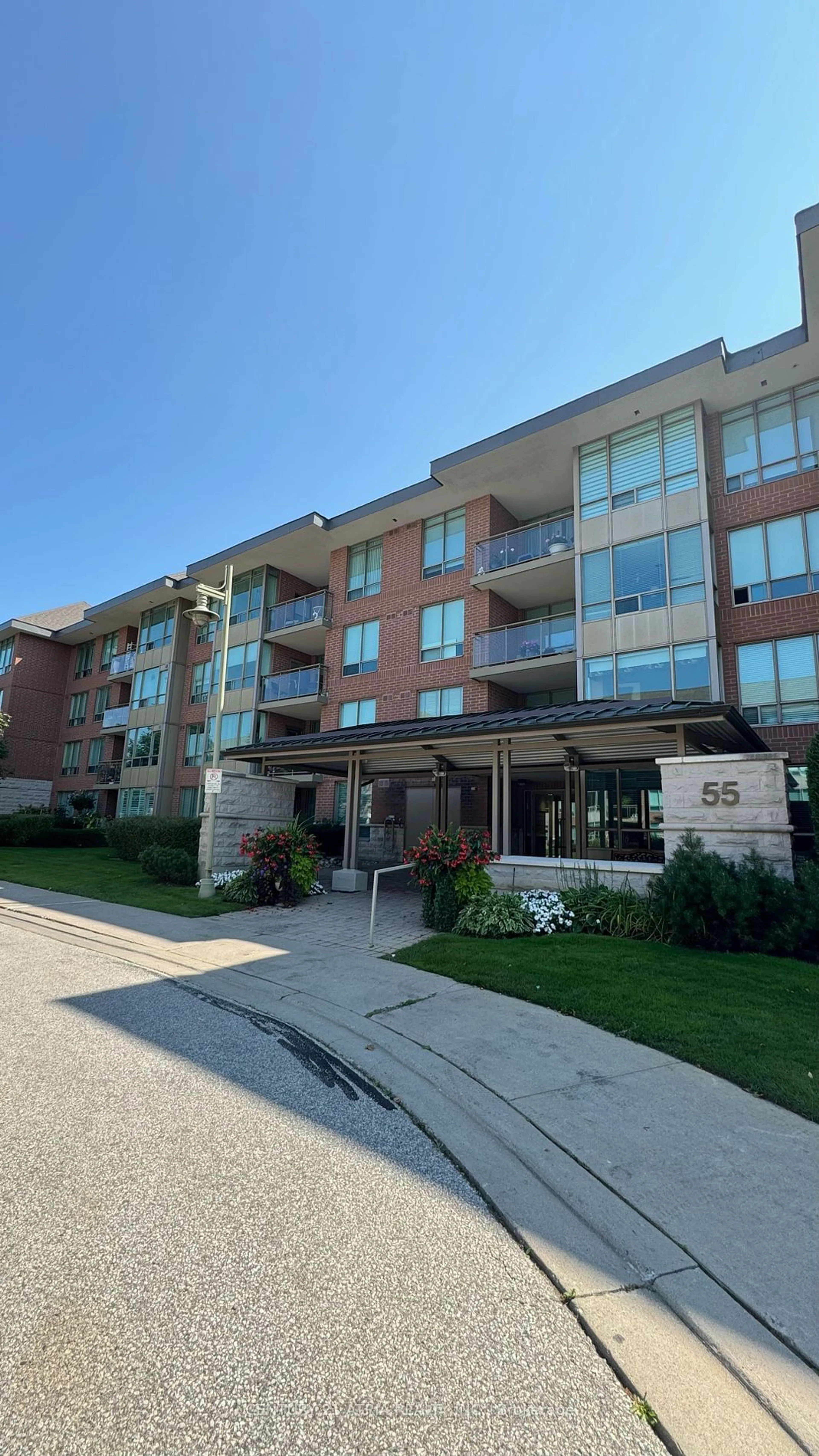 A pic from exterior of the house or condo, the front or back of building for 55 The Boardwalk Way #212, Markham Ontario L6E 1B7