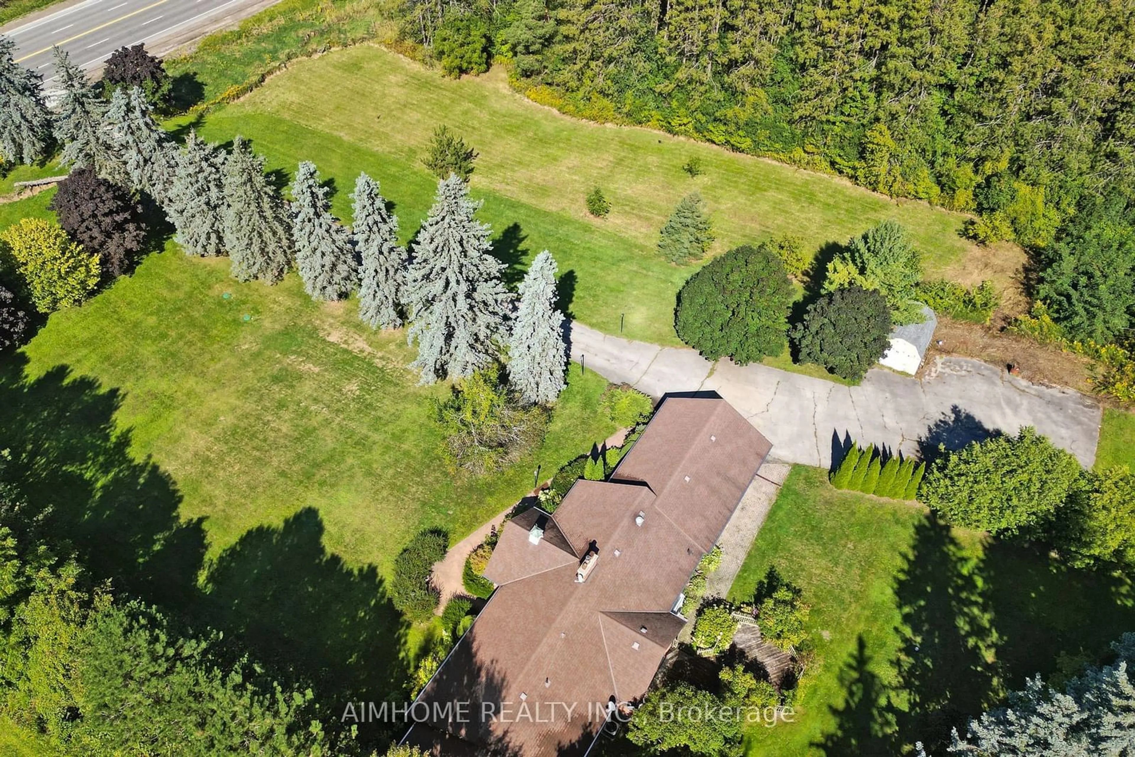 Frontside or backside of a home, the fenced backyard for 12301 Keele St, Vaughan Ontario L6A 2B3