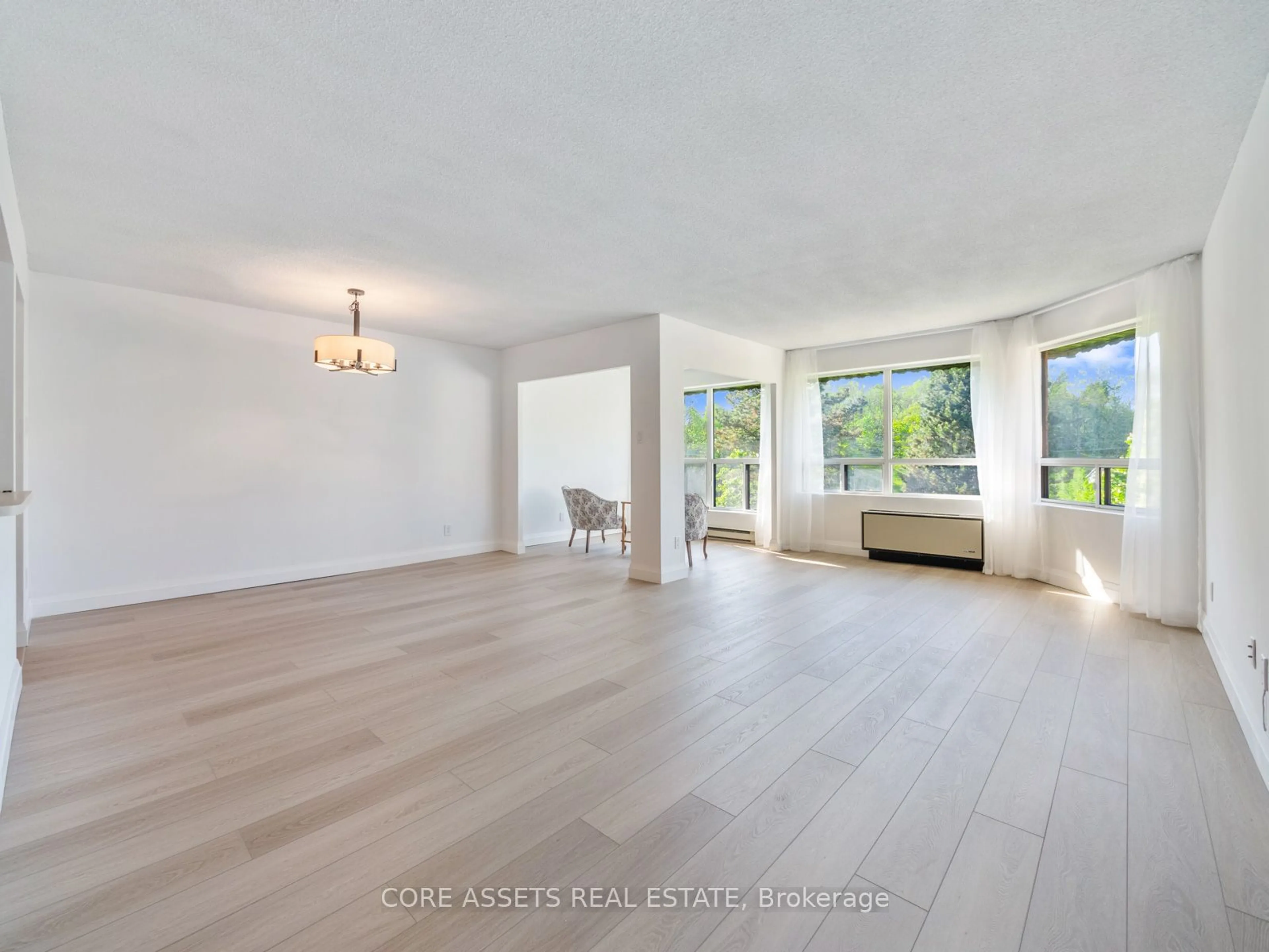 A pic of a room, wood floors for 155 Main St #333, Newmarket Ontario L3Y 8C2