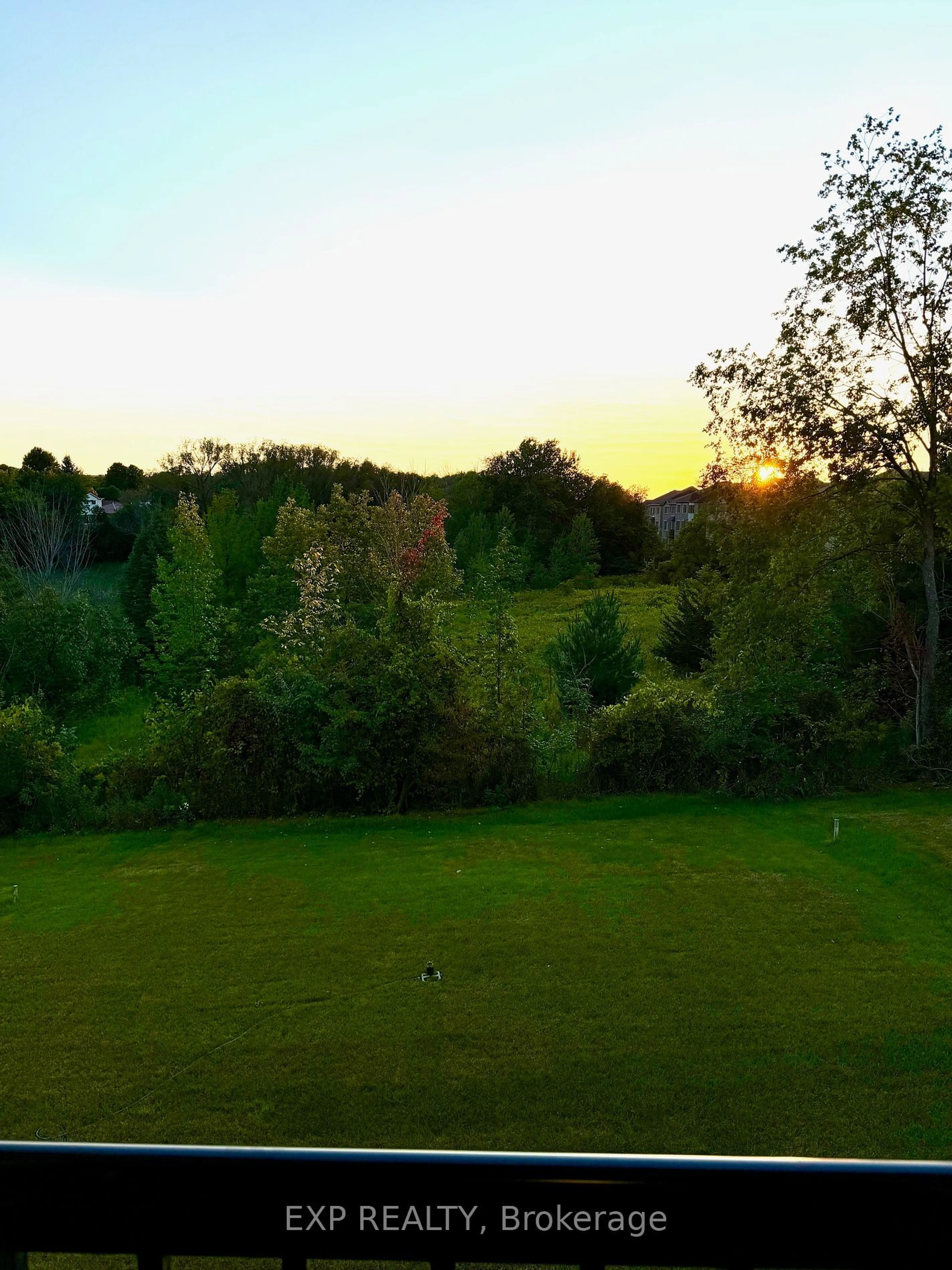 A pic from exterior of the house or condo, the fenced backyard for 24 Upbound Crt, East Gwillimbury Ontario L9N 0E5