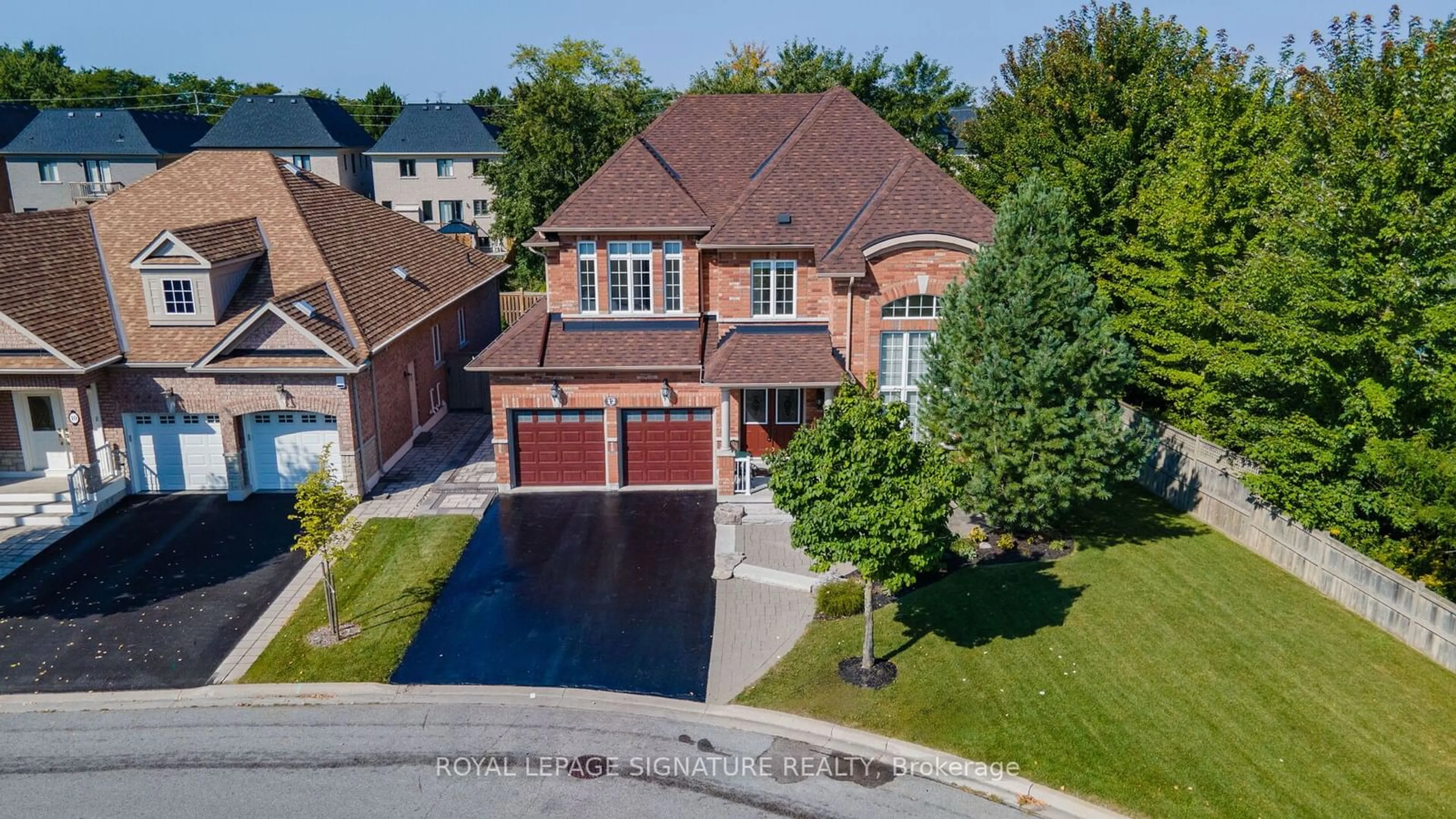 Home with brick exterior material for 12 Coakwell Dr, Markham Ontario L6B 0L7