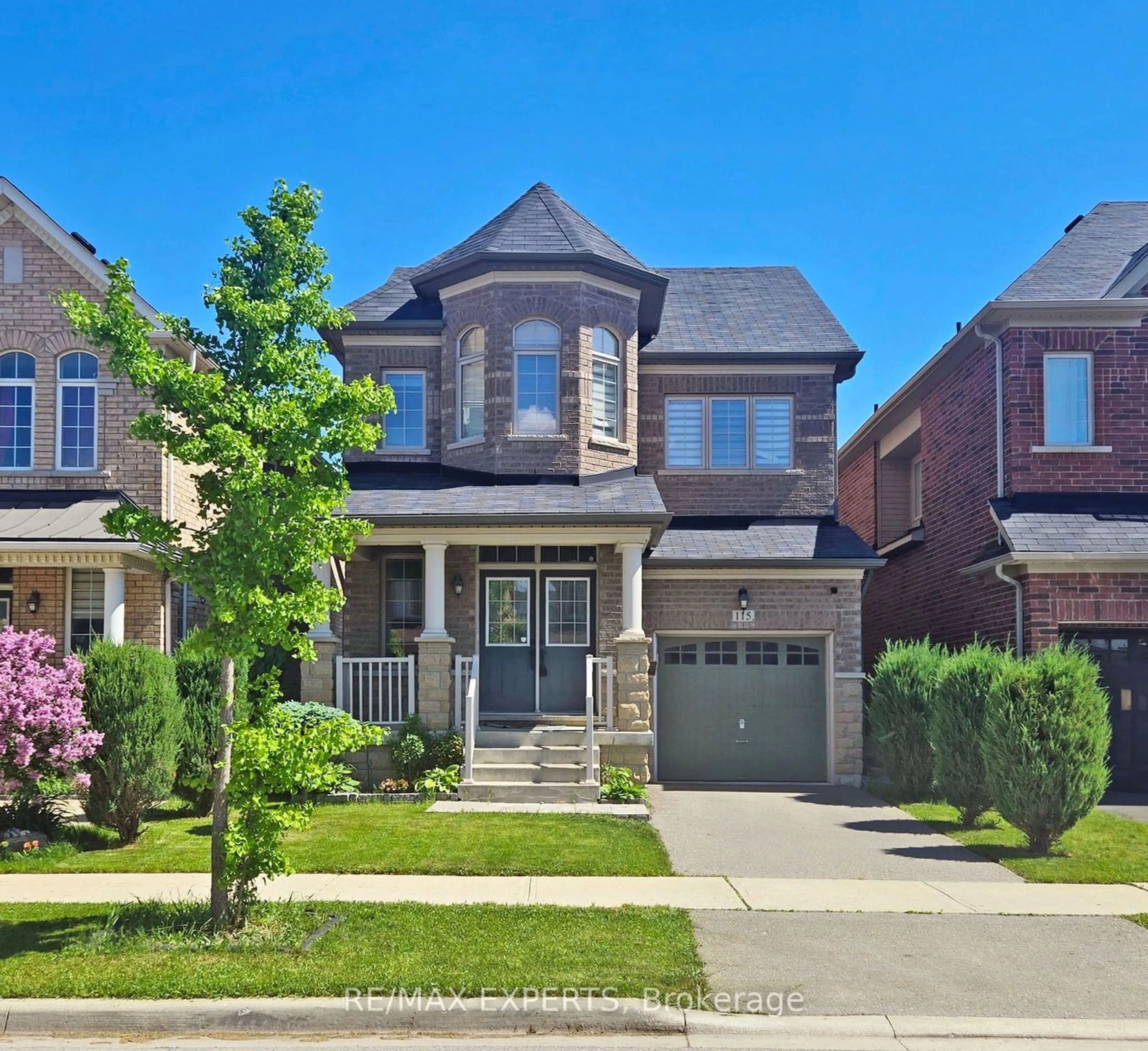 Frontside or backside of a home, the street view for 115 Killington Ave, Vaughan Ontario L4H 3Z6