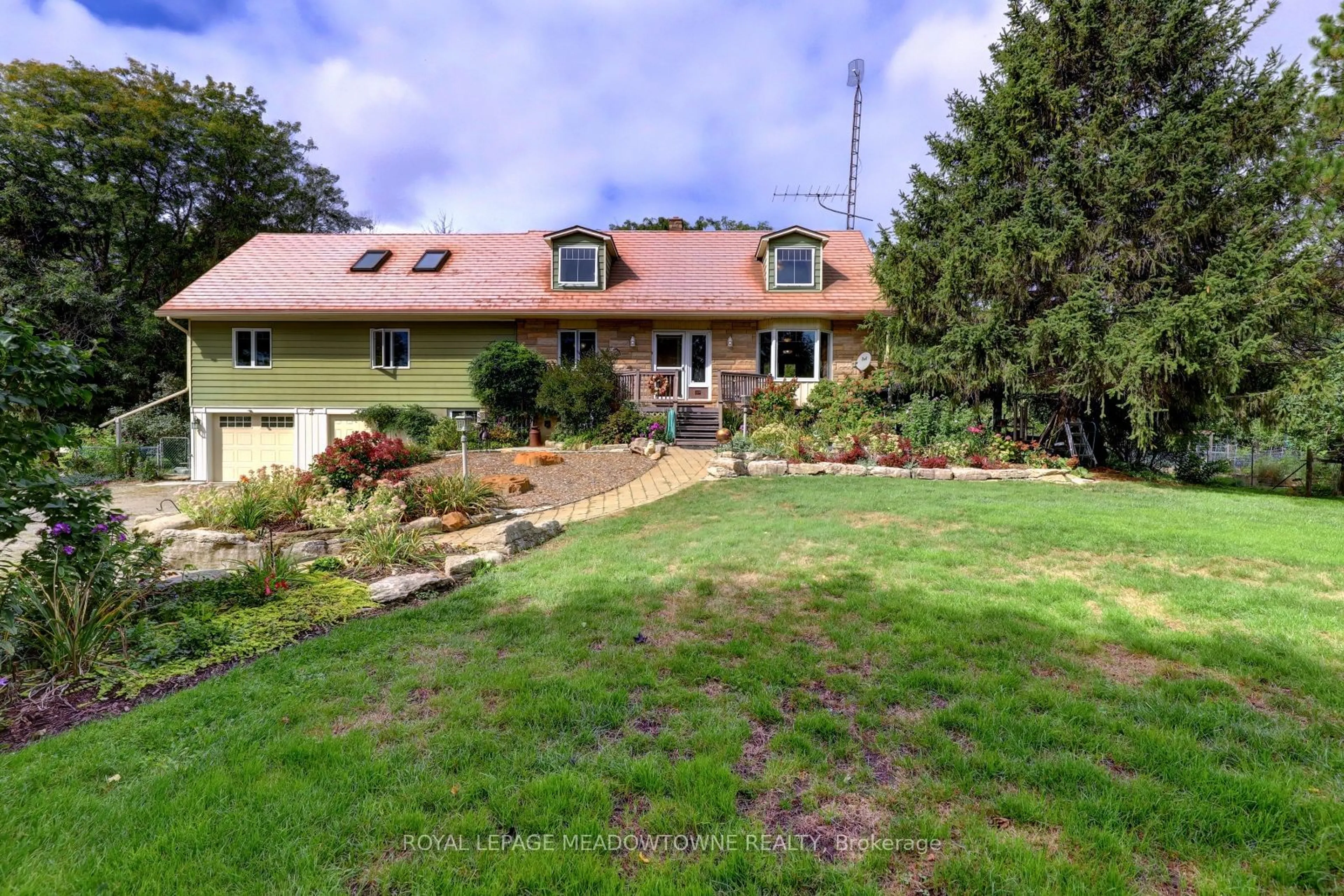 A pic from outside/outdoor area/front of a property/back of a property/a pic from drone, street for 6824 10th Line, New Tecumseth Ontario L0G 1A0