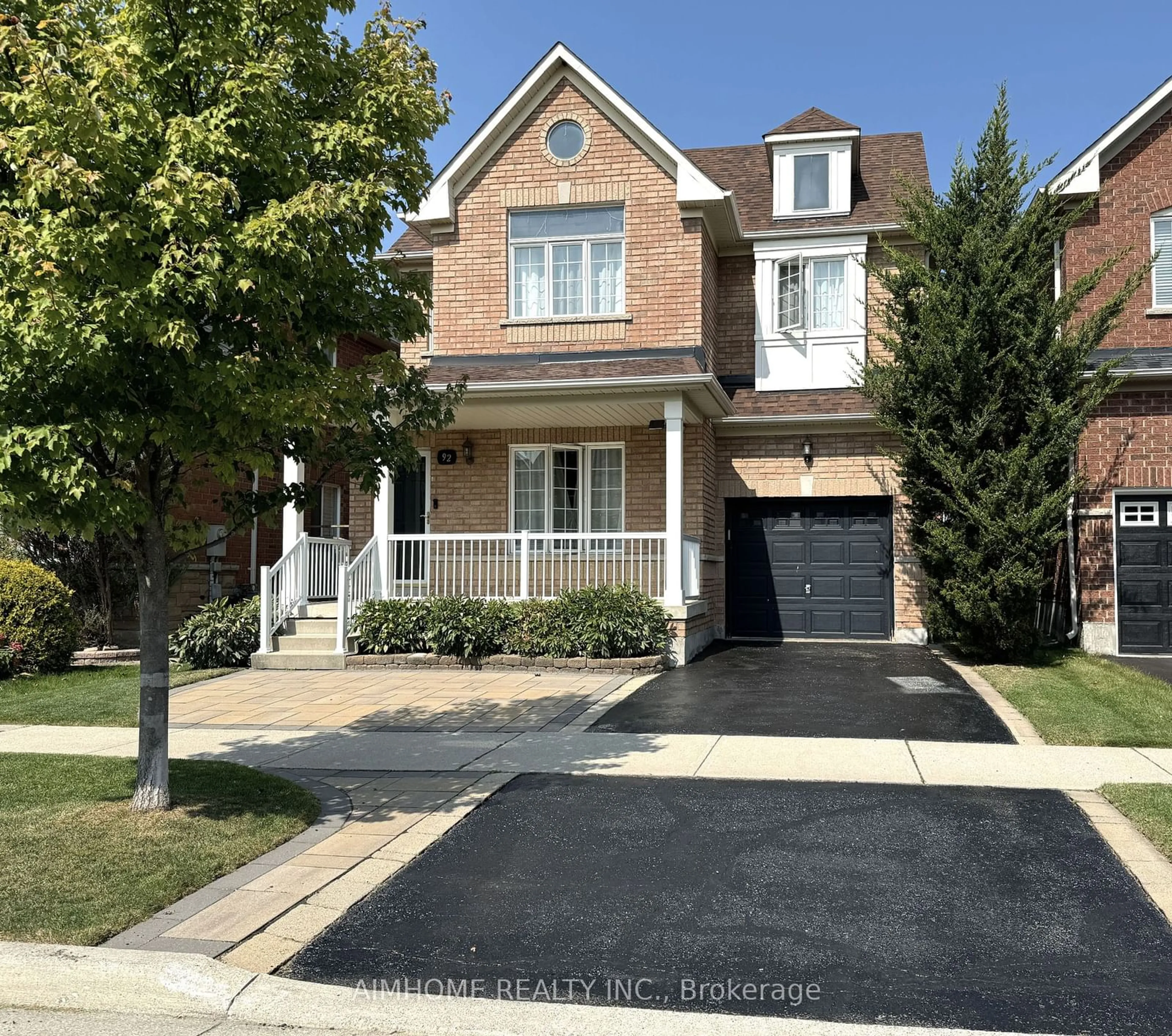 Frontside or backside of a home, the street view for 92 Barnwood Dr, Richmond Hill Ontario L4E 5A2