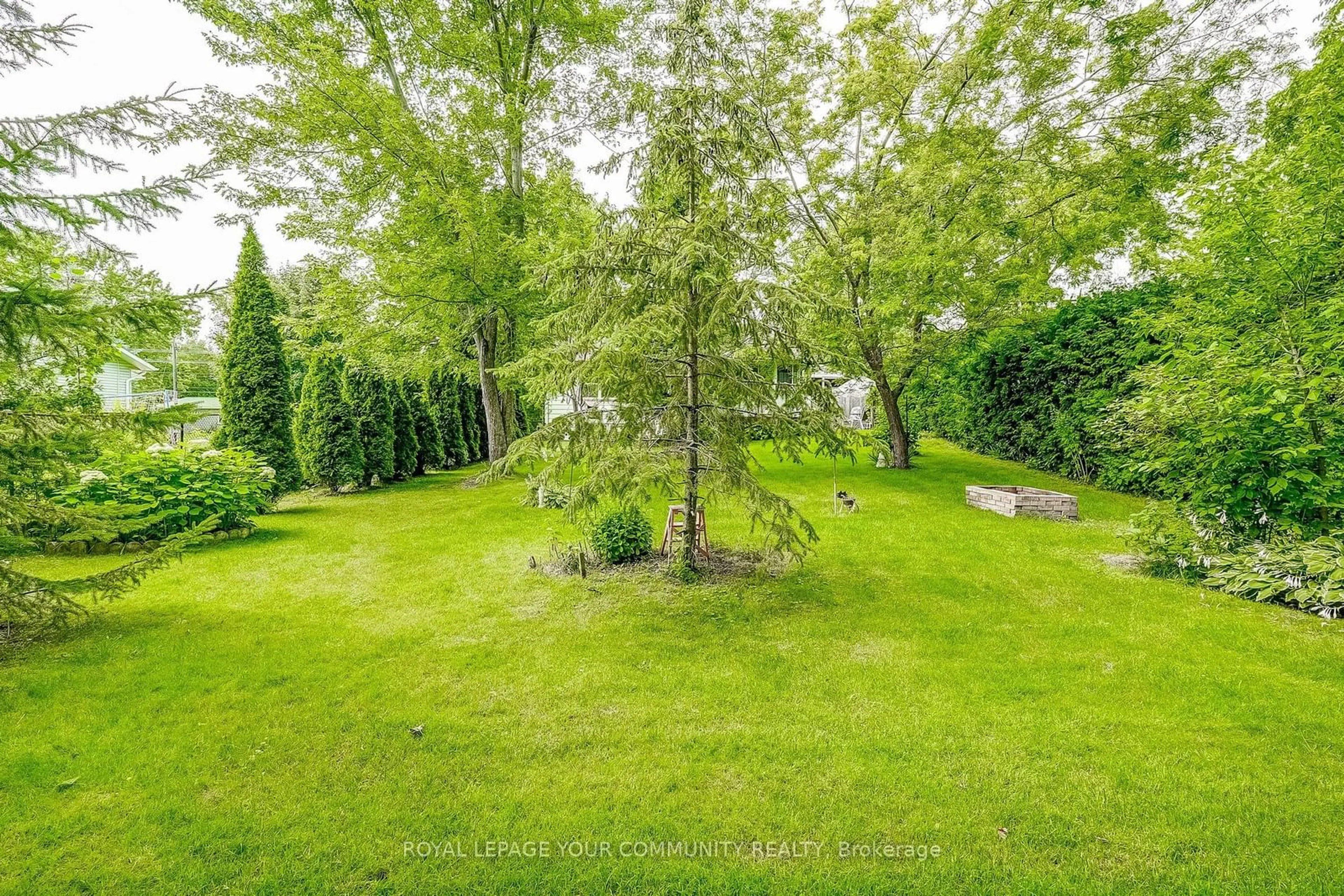 Patio, the fenced backyard for 25 Middle St, Georgina Ontario L0E 1R0