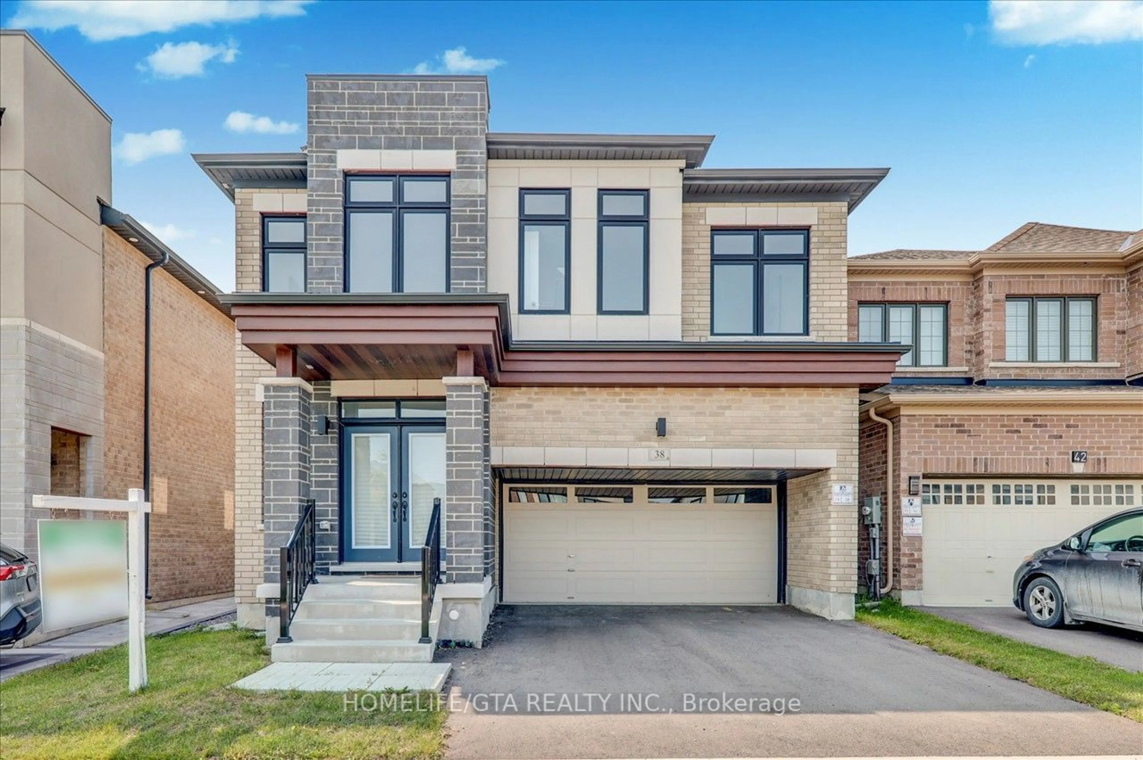 Home with brick exterior material for 38 Suttonrail Way, Whitchurch-Stouffville Ontario L4A 4X5