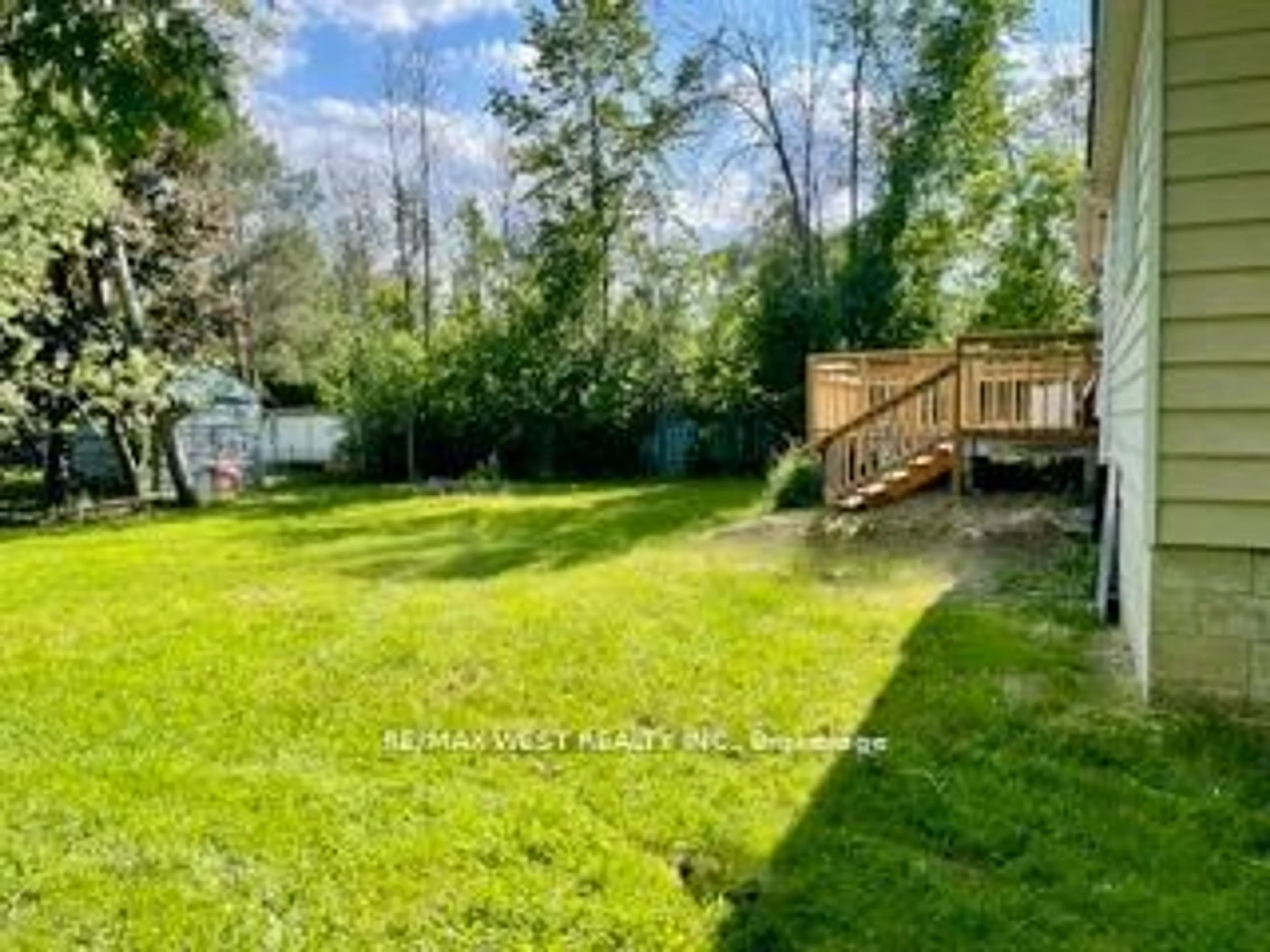 Frontside or backside of a home, the fenced backyard for 1081 Fern Rd, Innisfil Ontario L0L 1C0