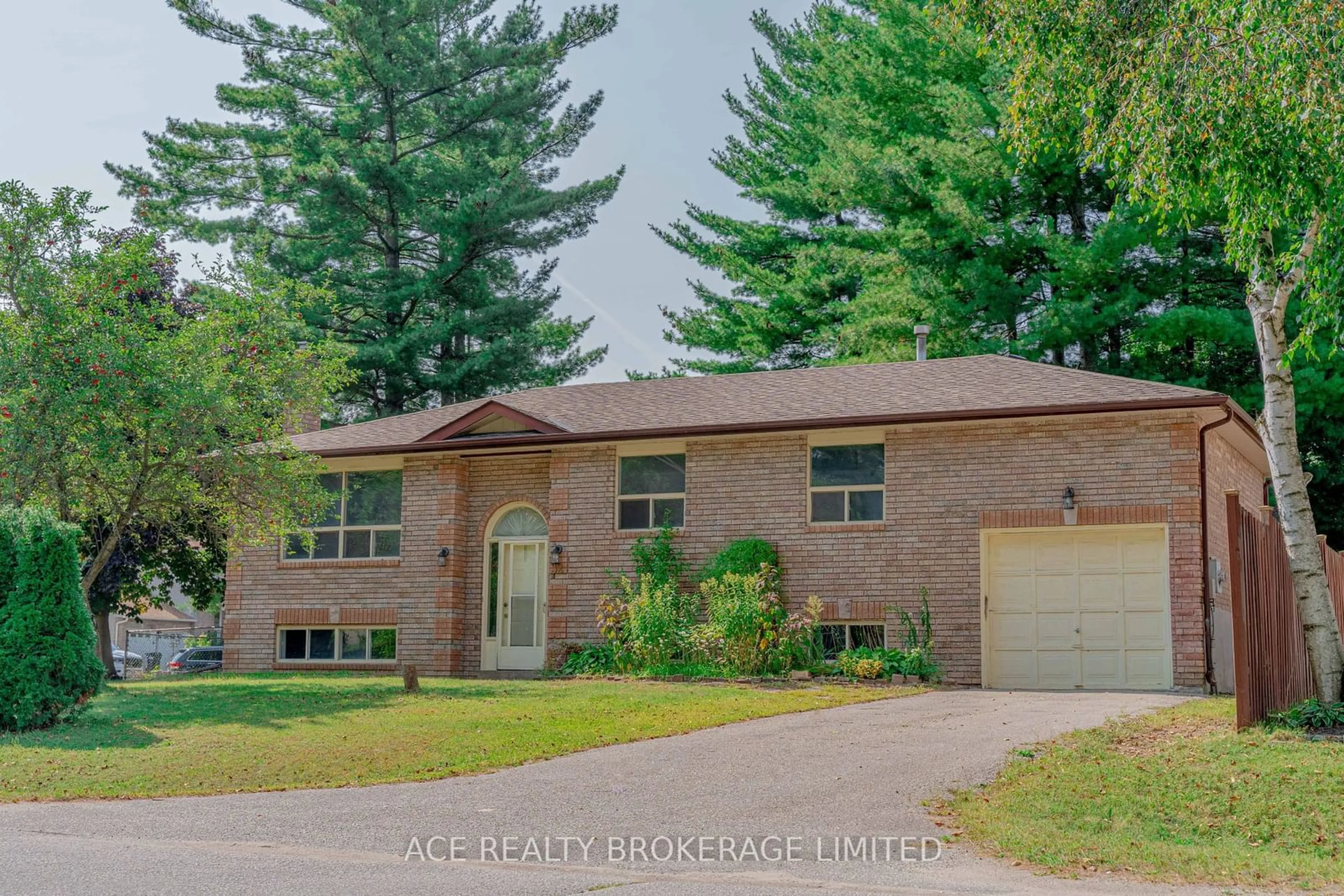 Home with brick exterior material for 32 Mansonic Way, Essa Ontario L3W 0J7