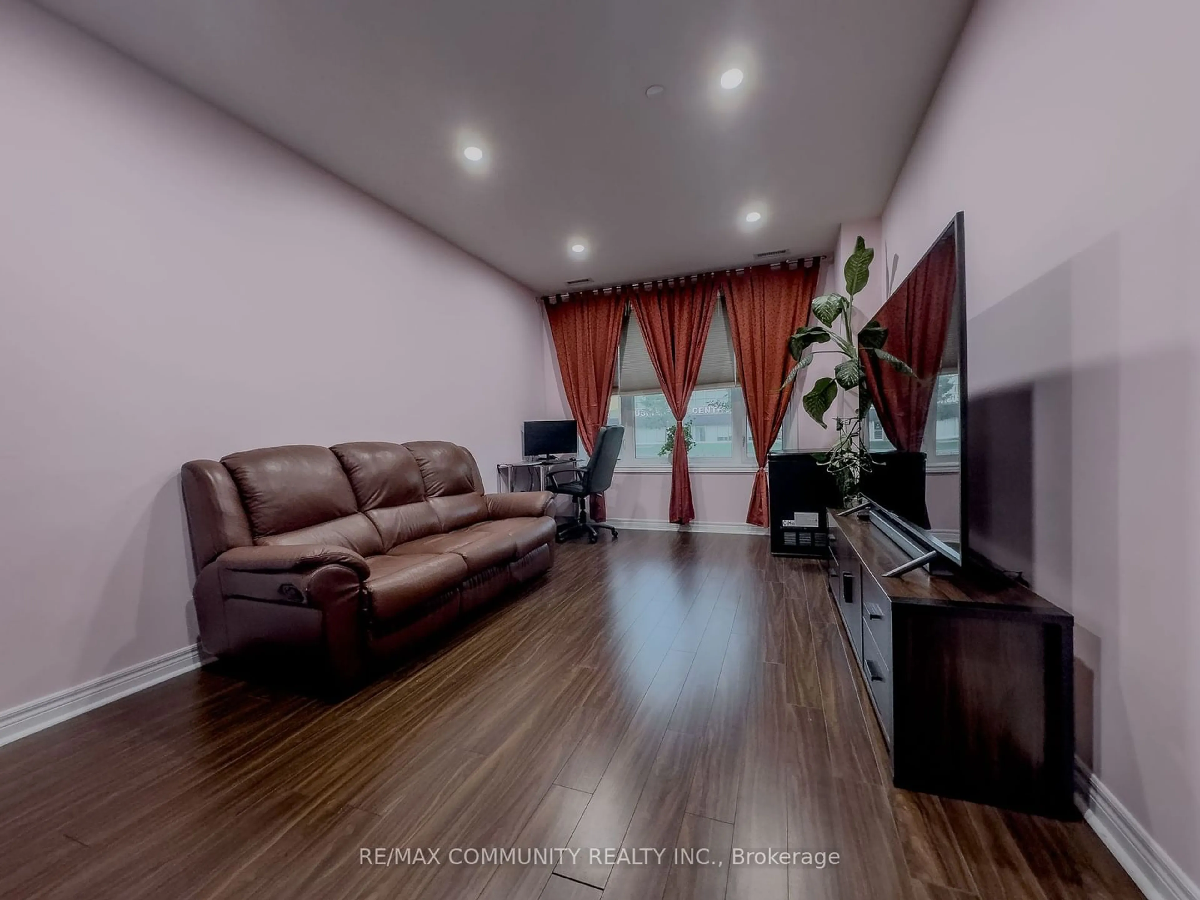 Living room, wood floors for 7400 Markham Rd #121, Markham Ontario L3S 0C5