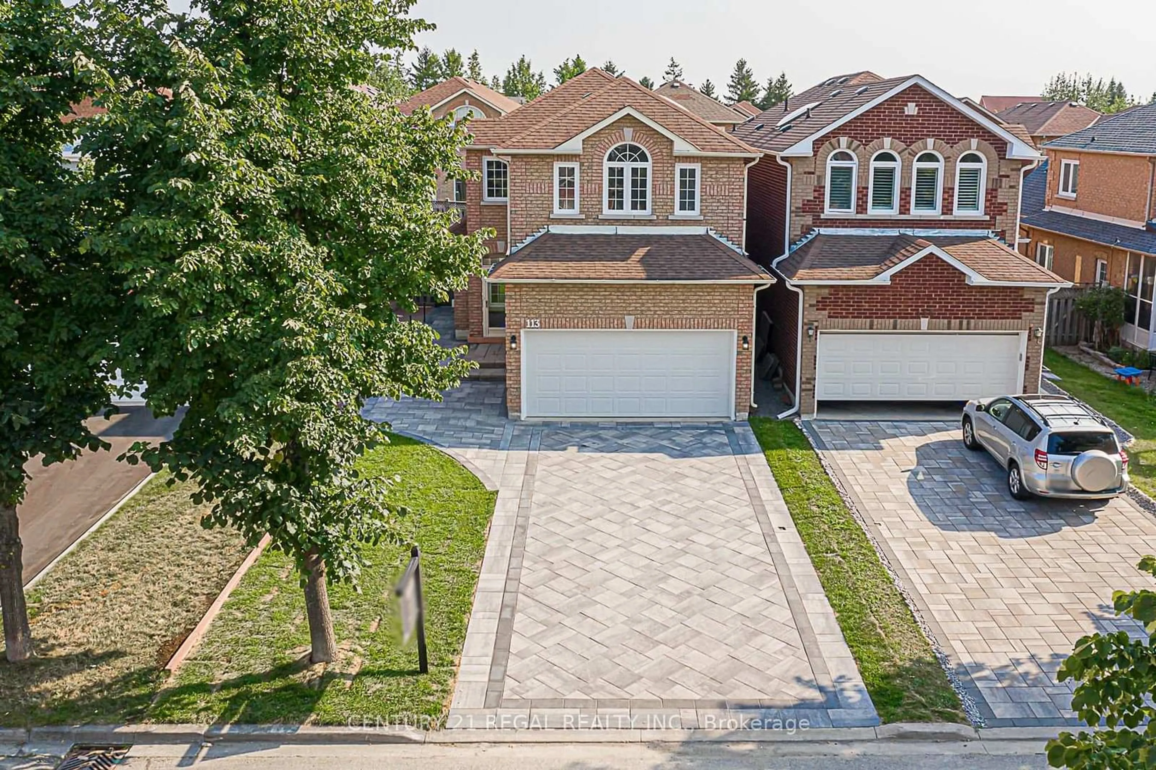 Home with brick exterior material for 113 Greensboro Dr, Markham Ontario L3R 0W1