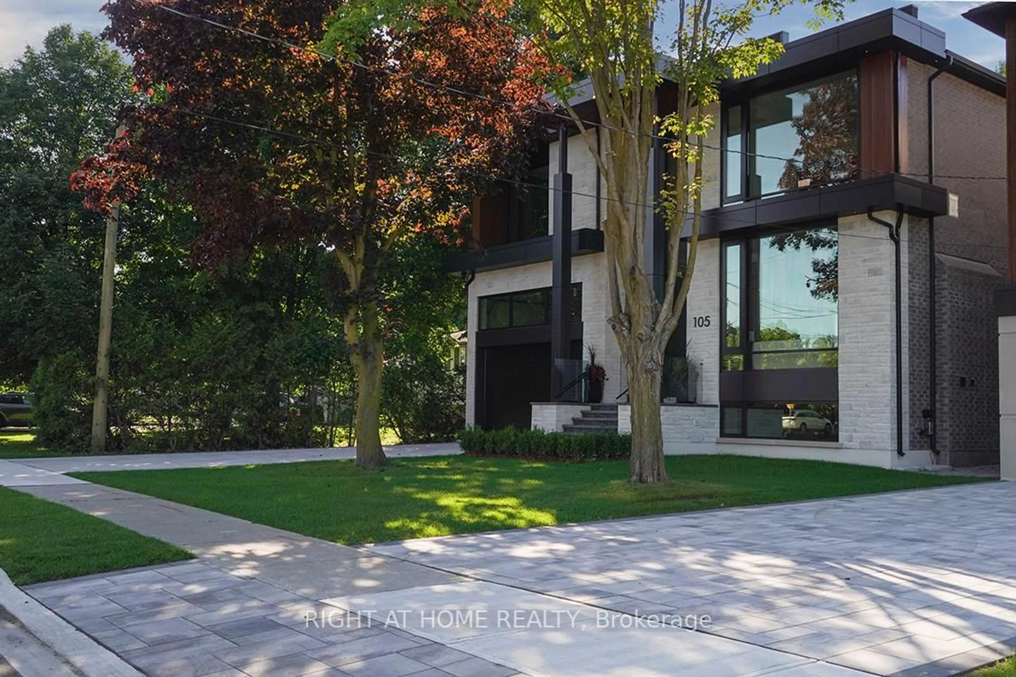 Frontside or backside of a home, the street view for 105 Douglas Rd, Richmond Hill Ontario L4E 3H1