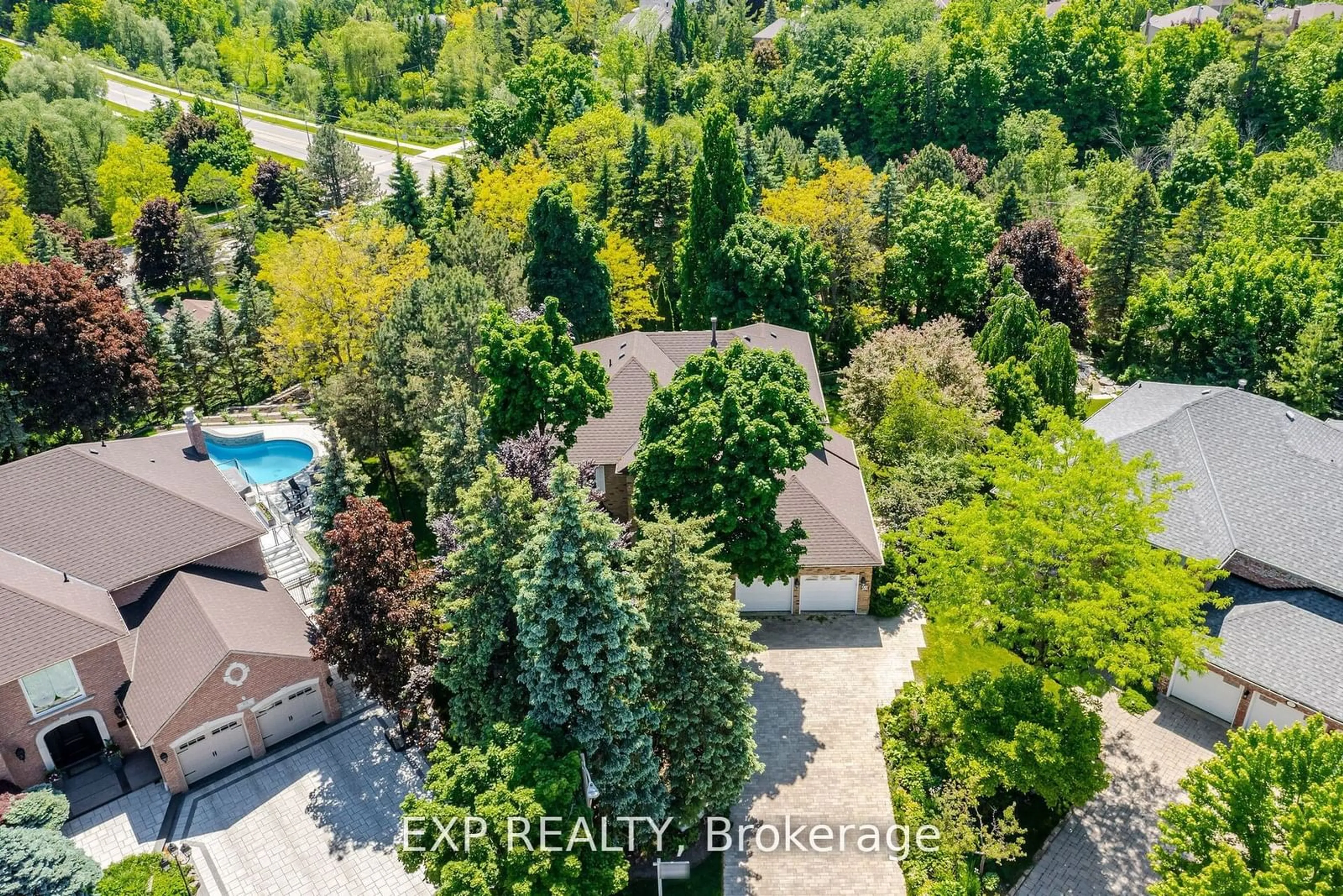 A pic from outside/outdoor area/front of a property/back of a property/a pic from drone, forest/trees view for 69 Kirkhill Pl, Vaughan Ontario L4L 7E5