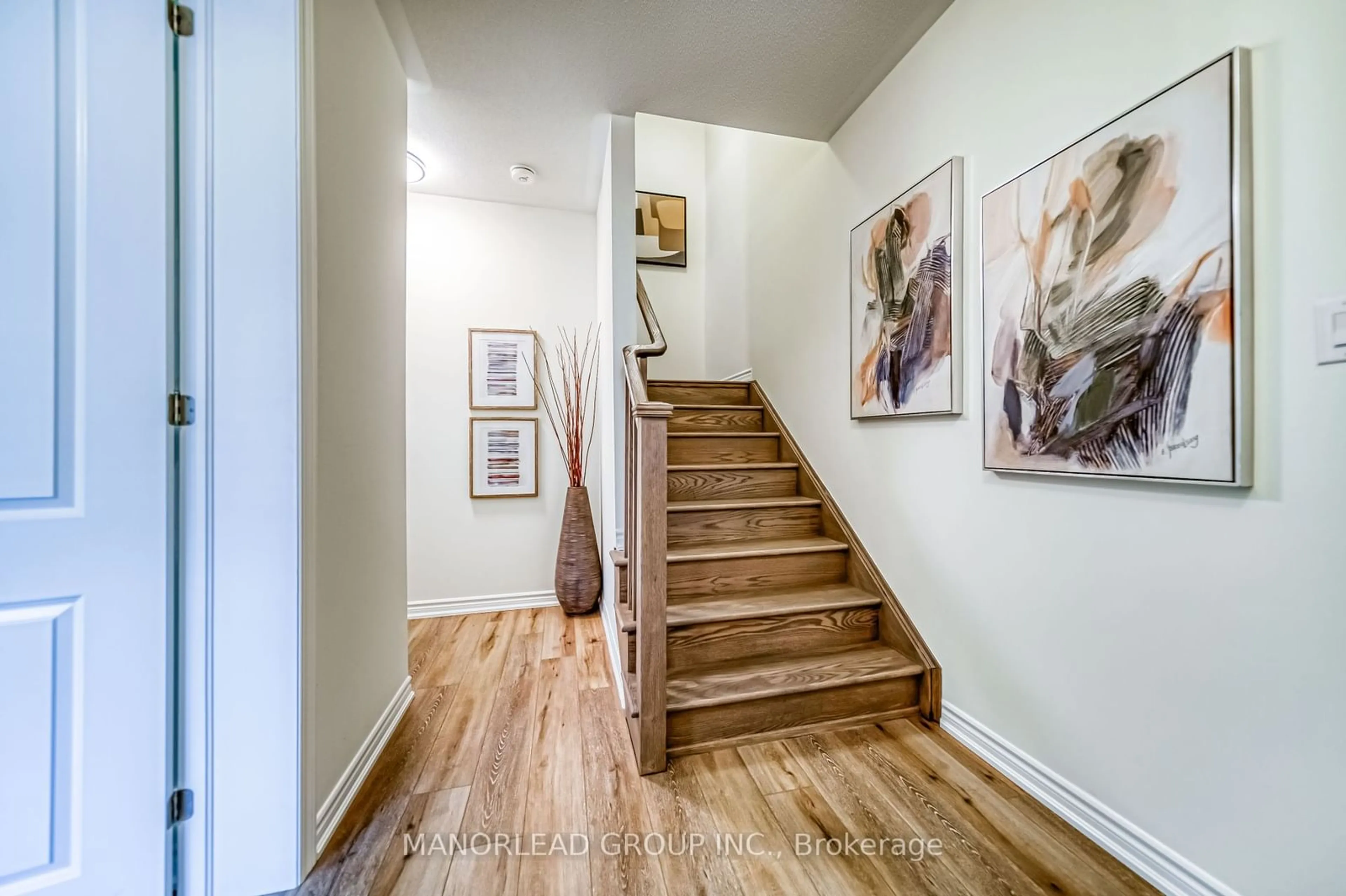 Indoor entryway, wood floors for 107 Thomas Frisby Jr Cres, Markham Ontario L6C 1L2