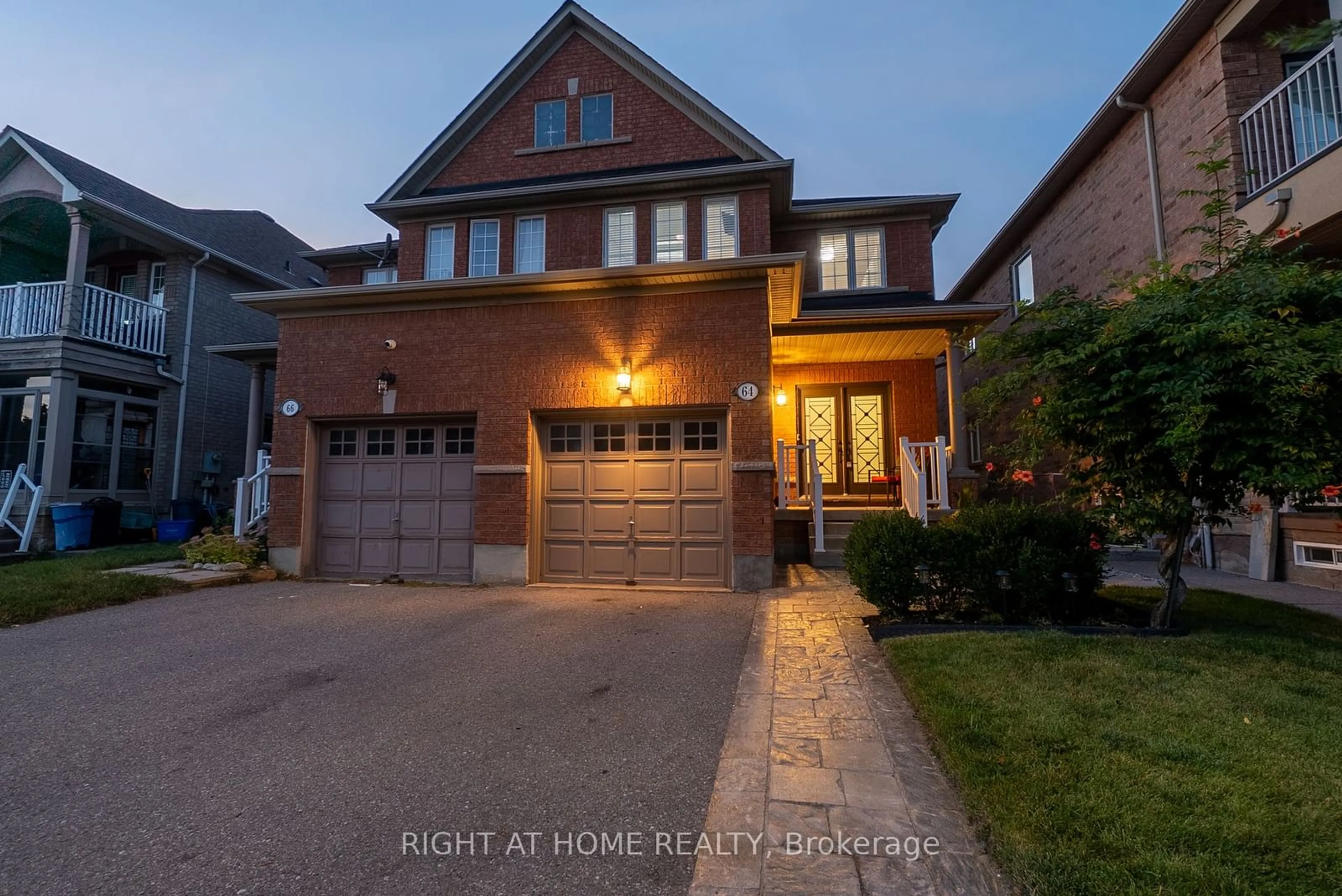 Frontside or backside of a home, the street view for 64 Mediterra Dr, Vaughan Ontario L4H 3B8