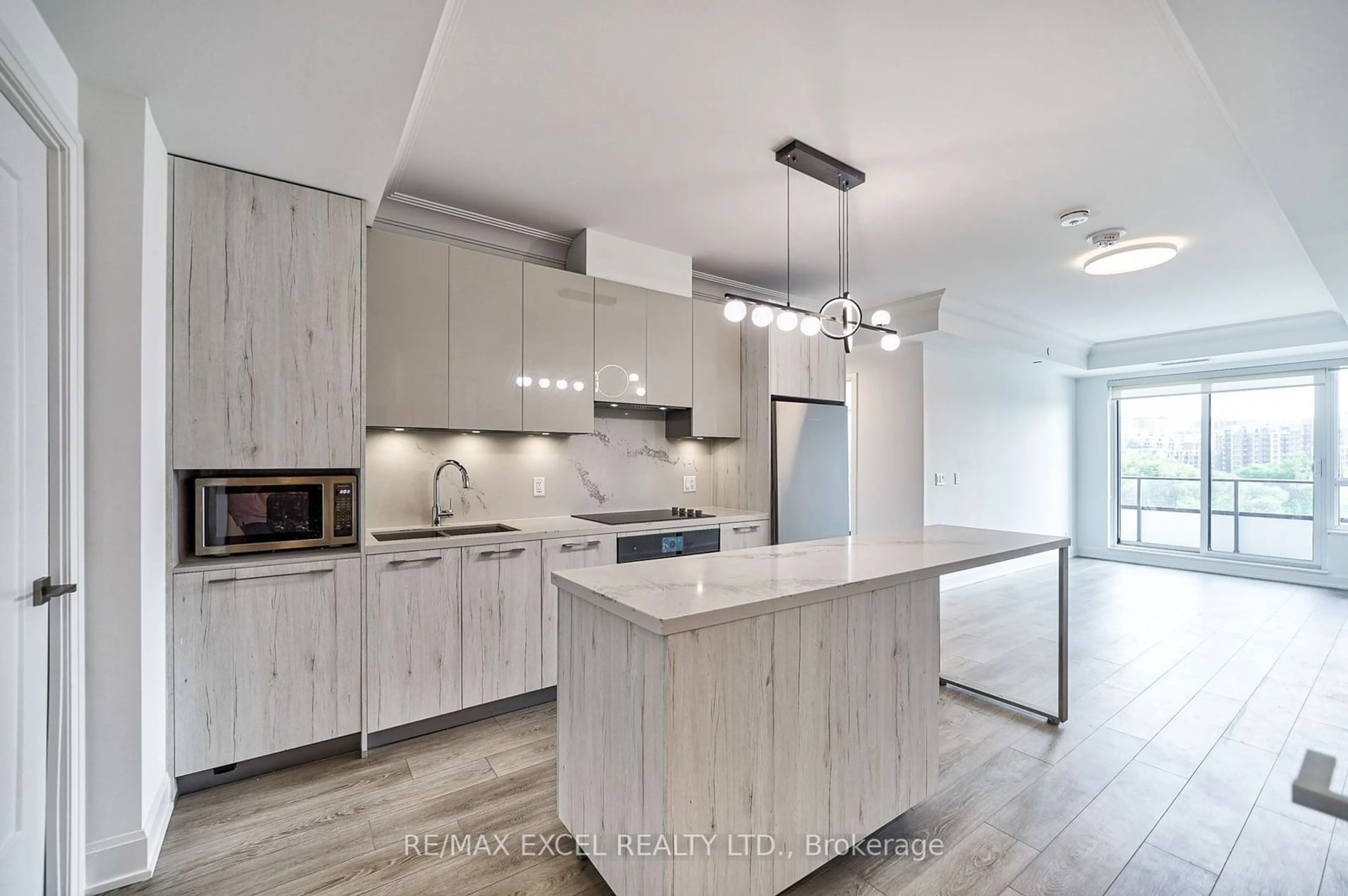 Open concept kitchen for 8 Water Walk Dr #601, Markham Ontario L3R 6L4