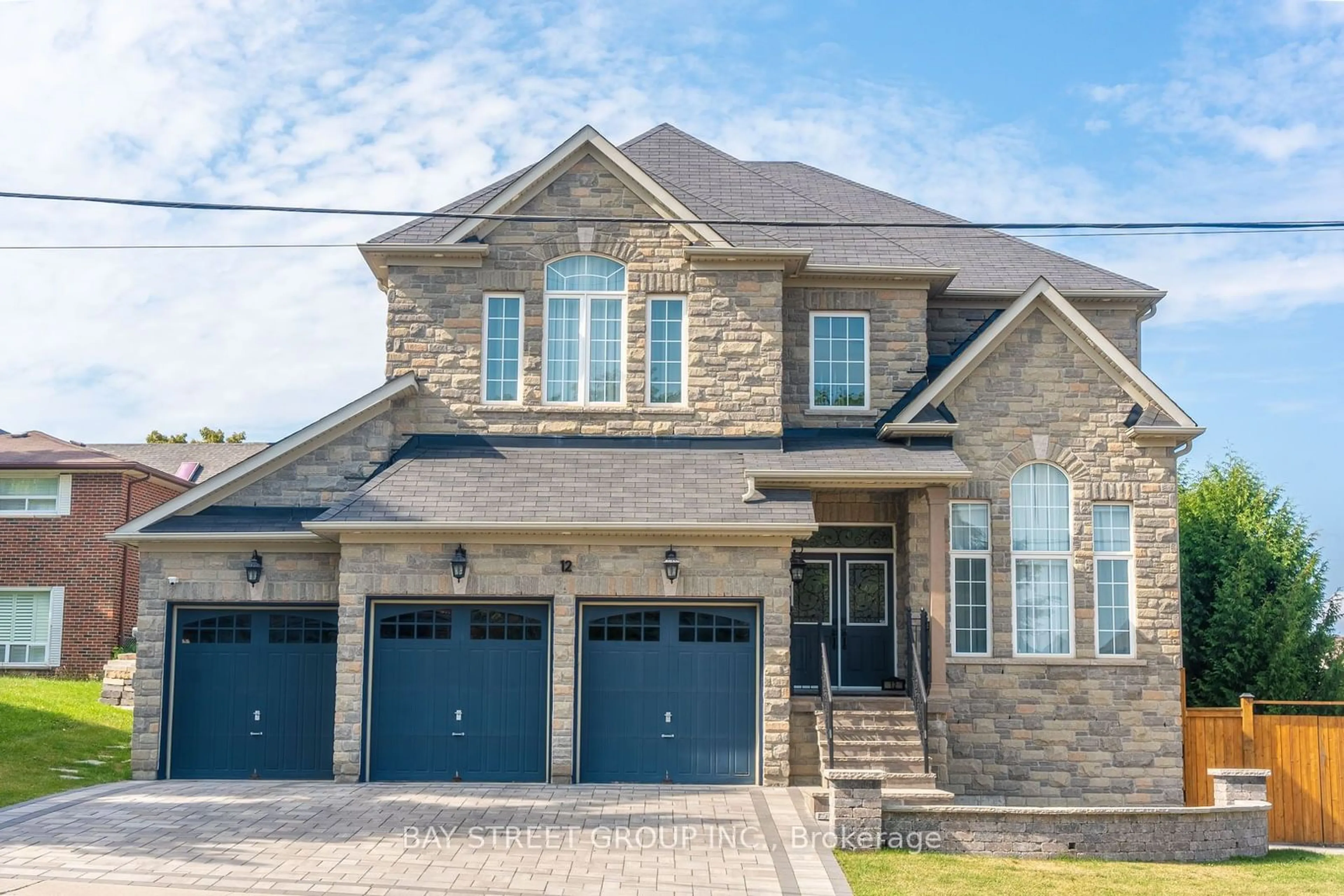 Home with brick exterior material for 12 Toscanini Rd, Richmond Hill Ontario L4E 2Y7