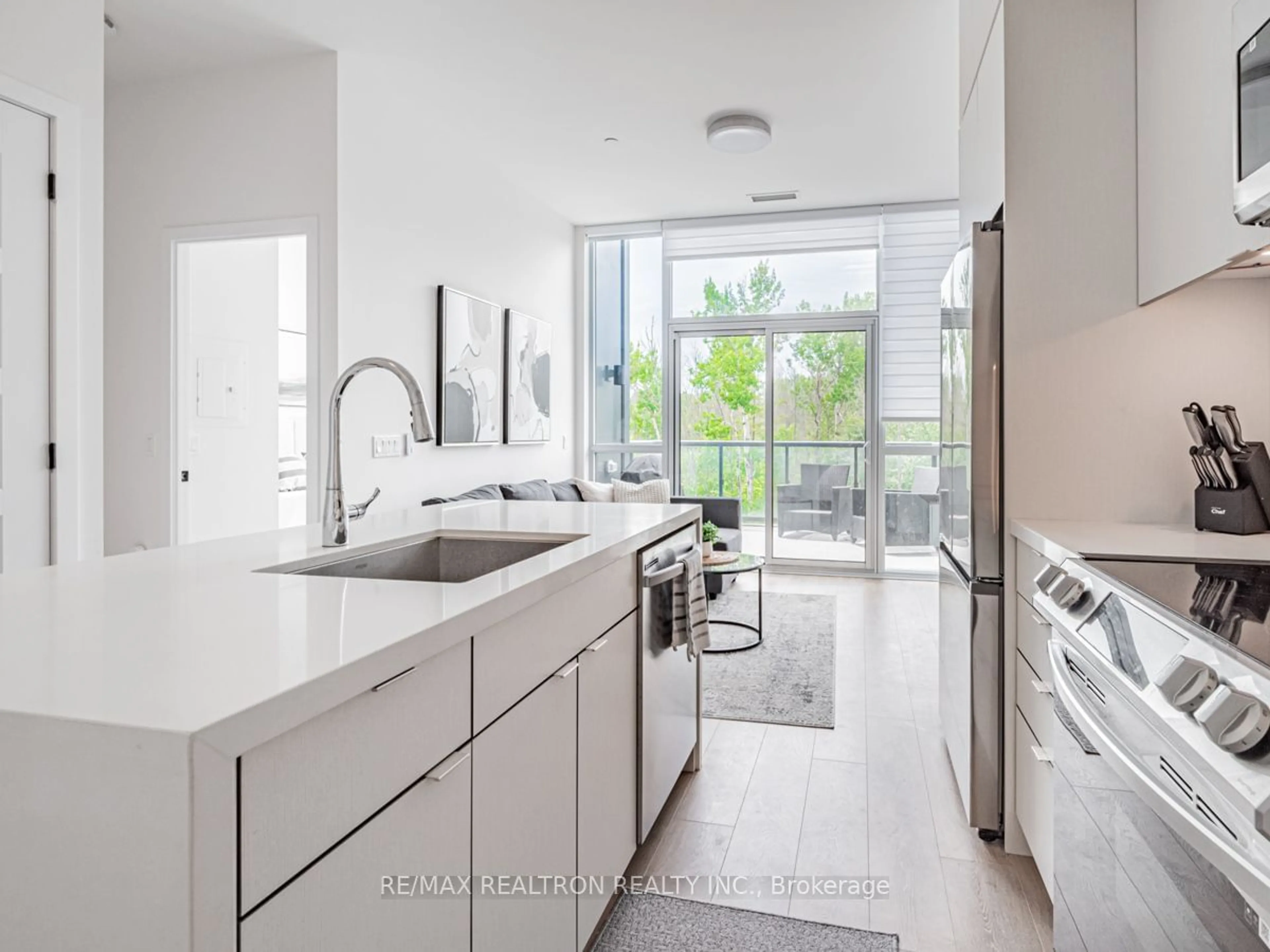 Contemporary kitchen, wood floors for 415 Sea Ray Ave #445, Innisfil Ontario L9S 0R5